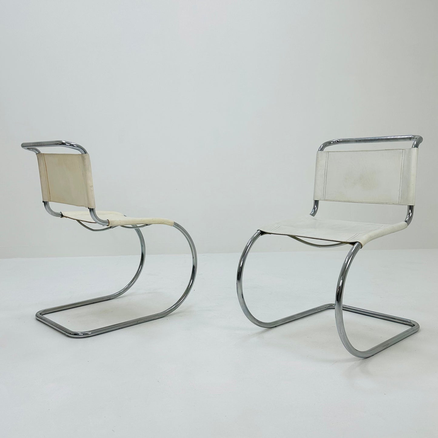 Set of 2 MR10 lounge white leather chairs design by Ludwig Mies van der Rohe , 1980s