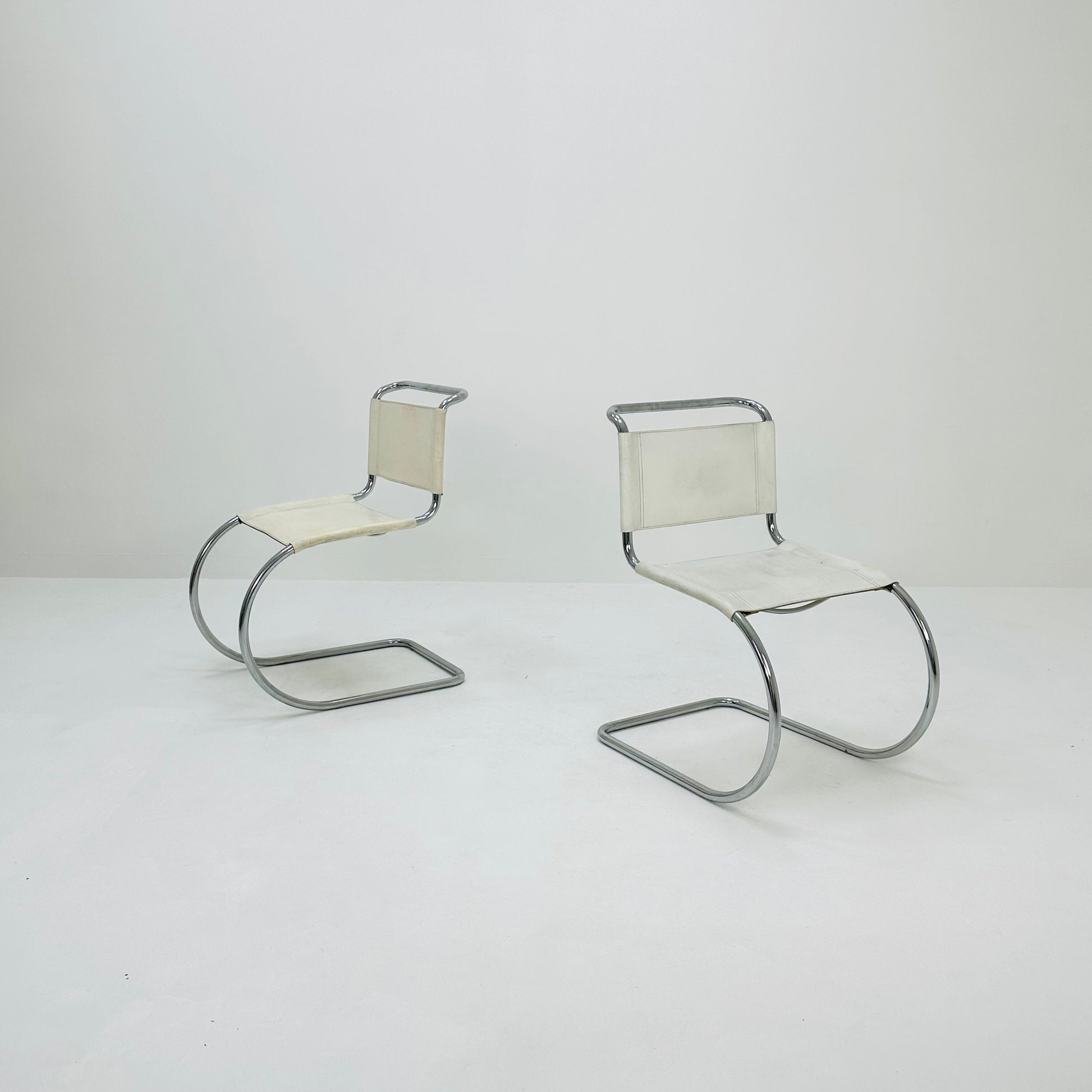 Set of 2 MR10 lounge white leather chairs design by Ludwig Mies van der Rohe , 1980s