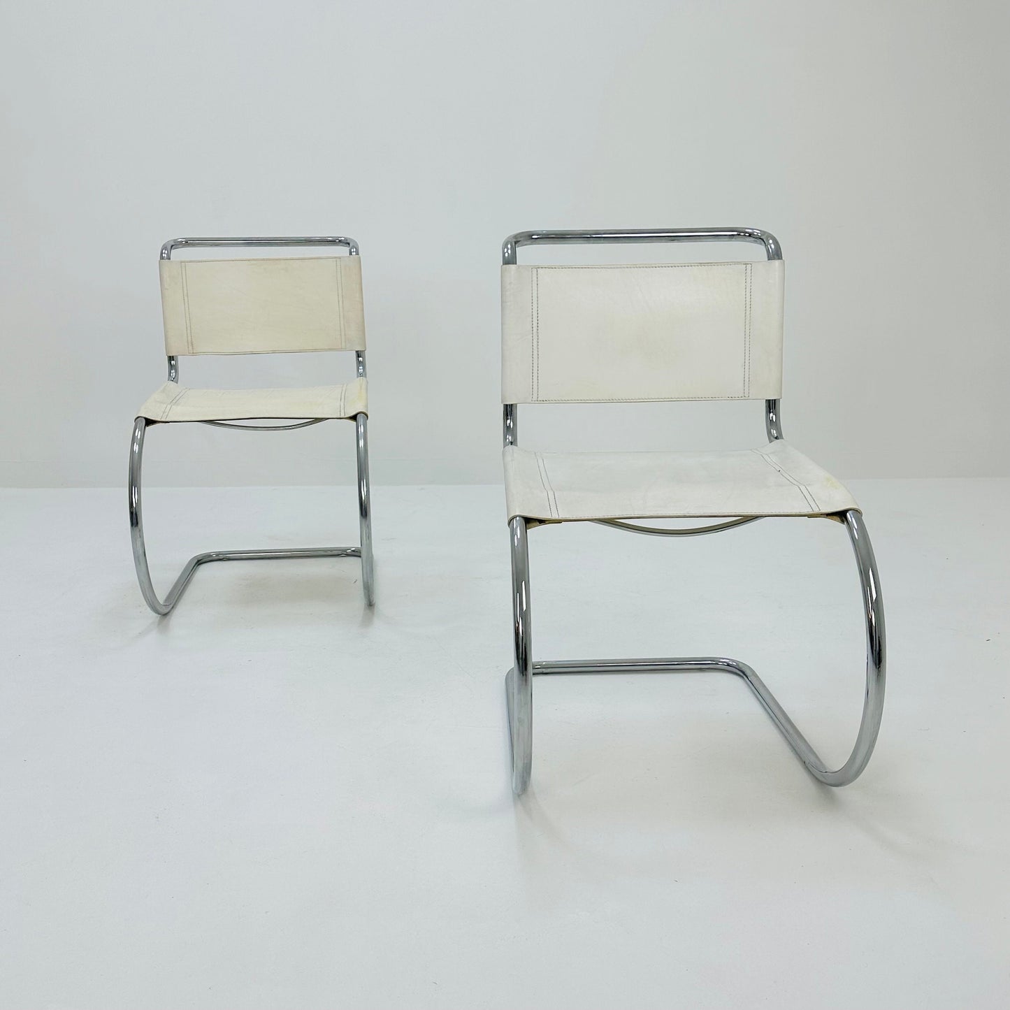 Set of 2 MR10 lounge white leather chairs design by Ludwig Mies van der Rohe , 1980s