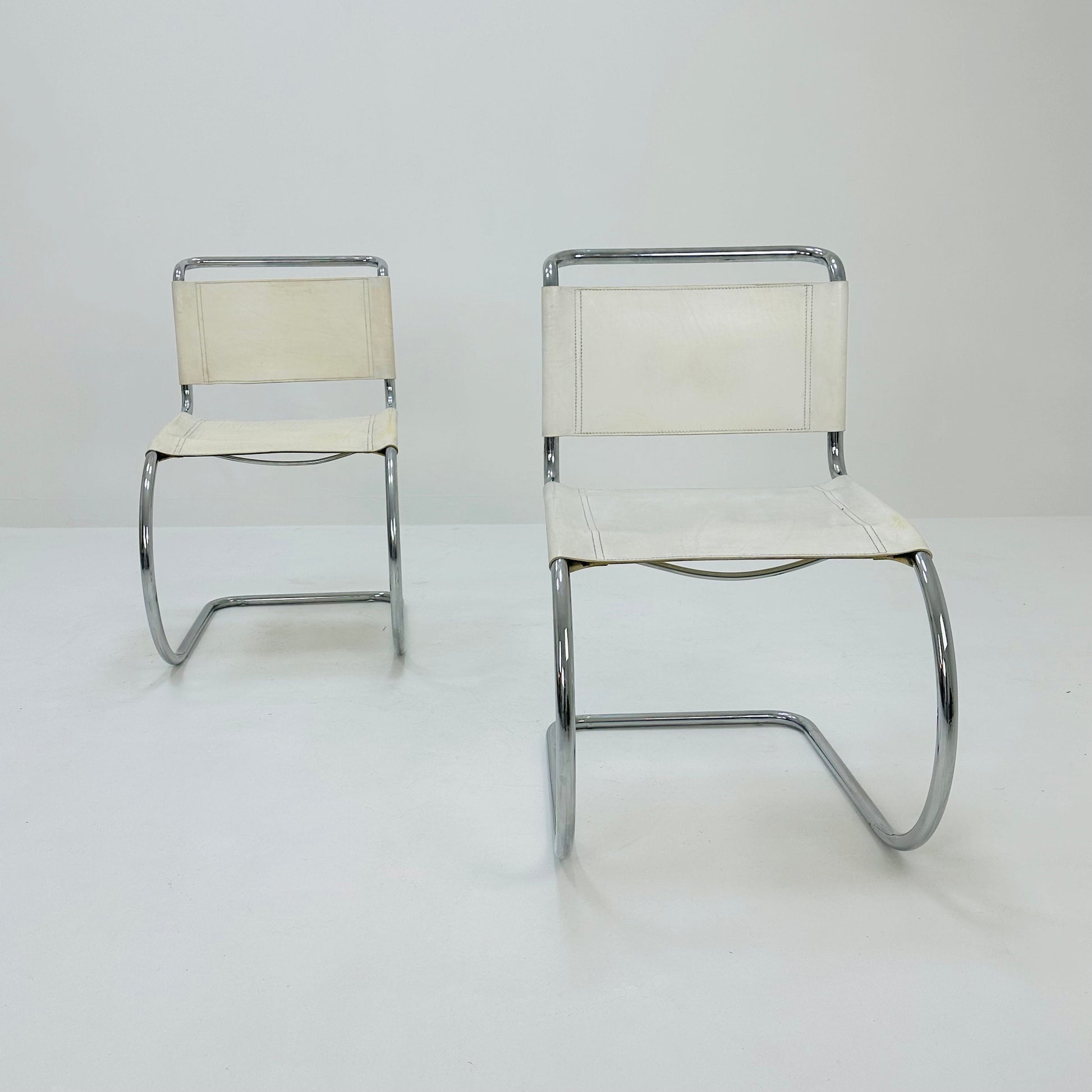Set of 2 MR10 lounge white leather chairs design by Ludwig Mies van der Rohe , 1980s
