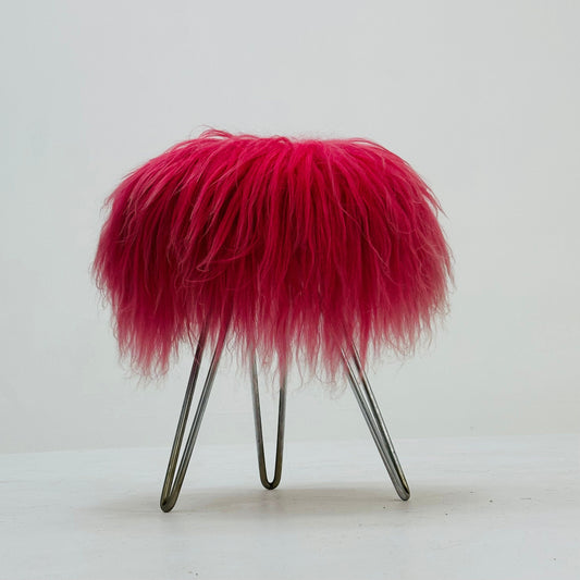 Beautiful mid-century pink Flokati stool with goat hair upholstery and three-legged hairpin feet.1960s Germany