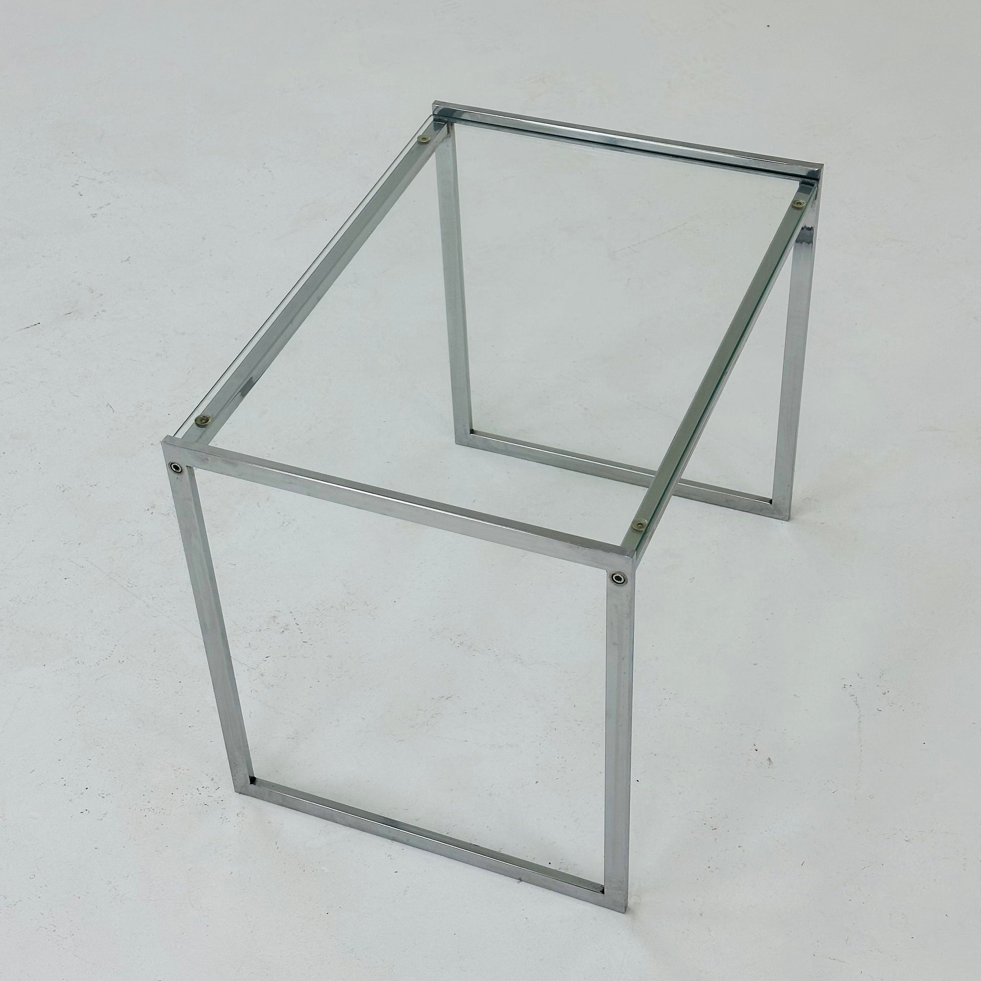 Set of tow Bauhaus side tables / bar tables in chrome and glass Italy 1970s