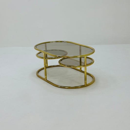 Mid century swivel coffee table brass & smoked glass ,by Milo Baughman, 1970s Italy 