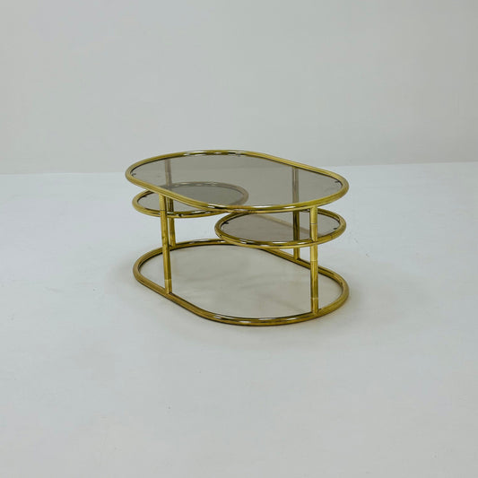 Mid century swivel coffee table brass & smoked glass ,by Milo Baughman, 1970s Italy