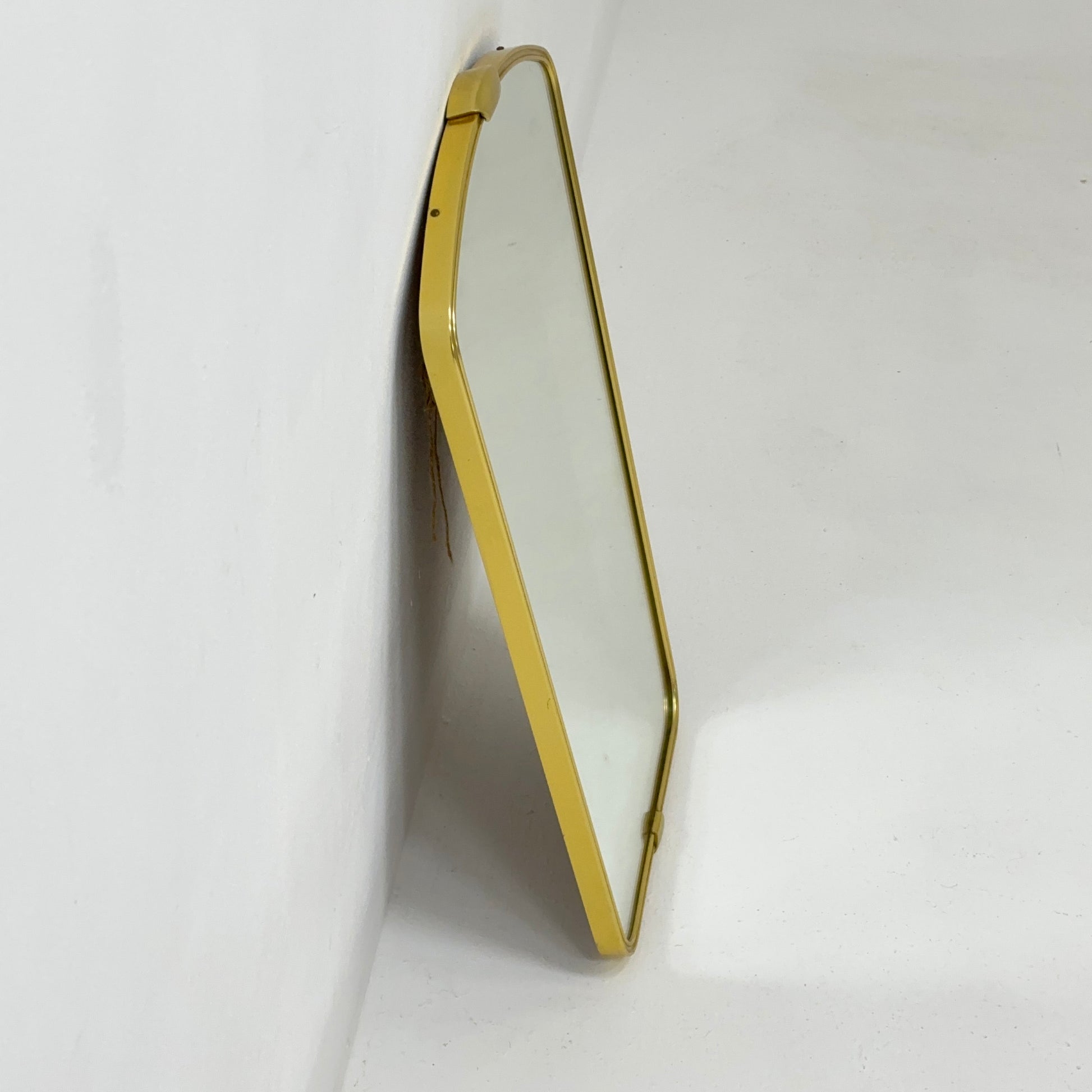 Mid Century asymmetric German brass Original kidney wall mirror from the 60s model number 986