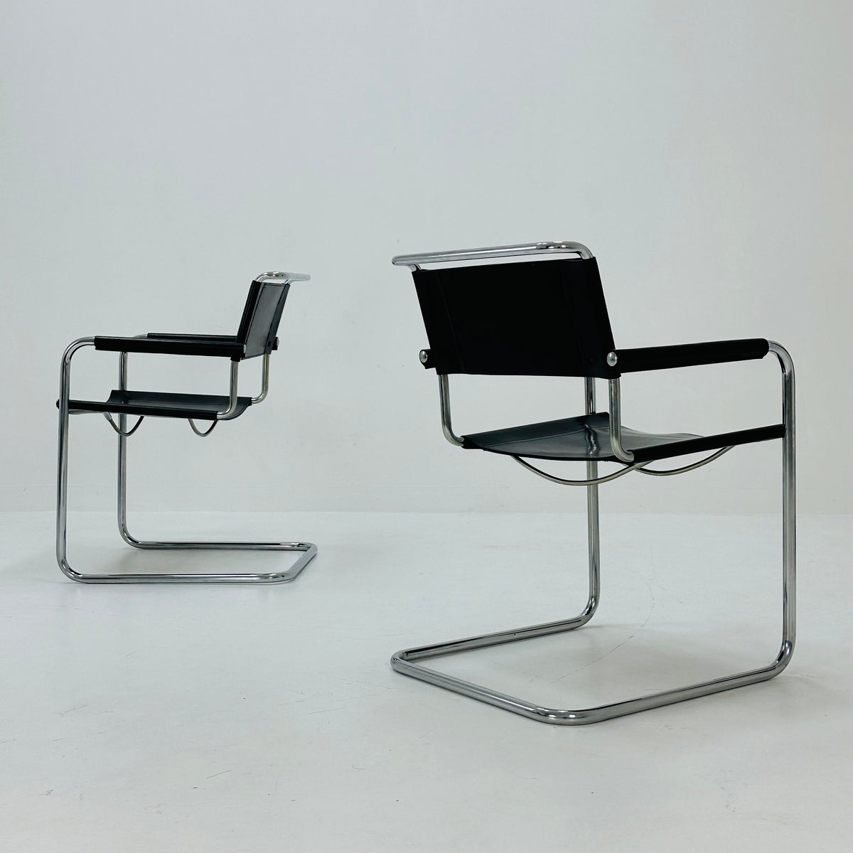Set of 2 black S34 tubular steel chairs by Mart Stam for Jox Interni - 1970s