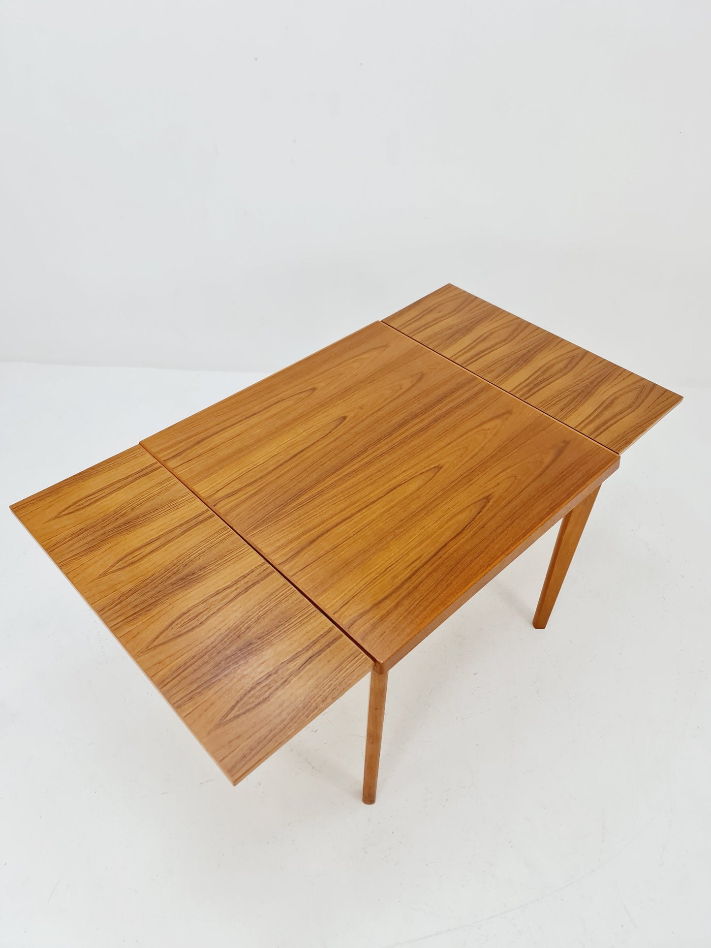 Danish Henning Kjaernulf rectangular teak table with two extension leaves, Denmark 1960s