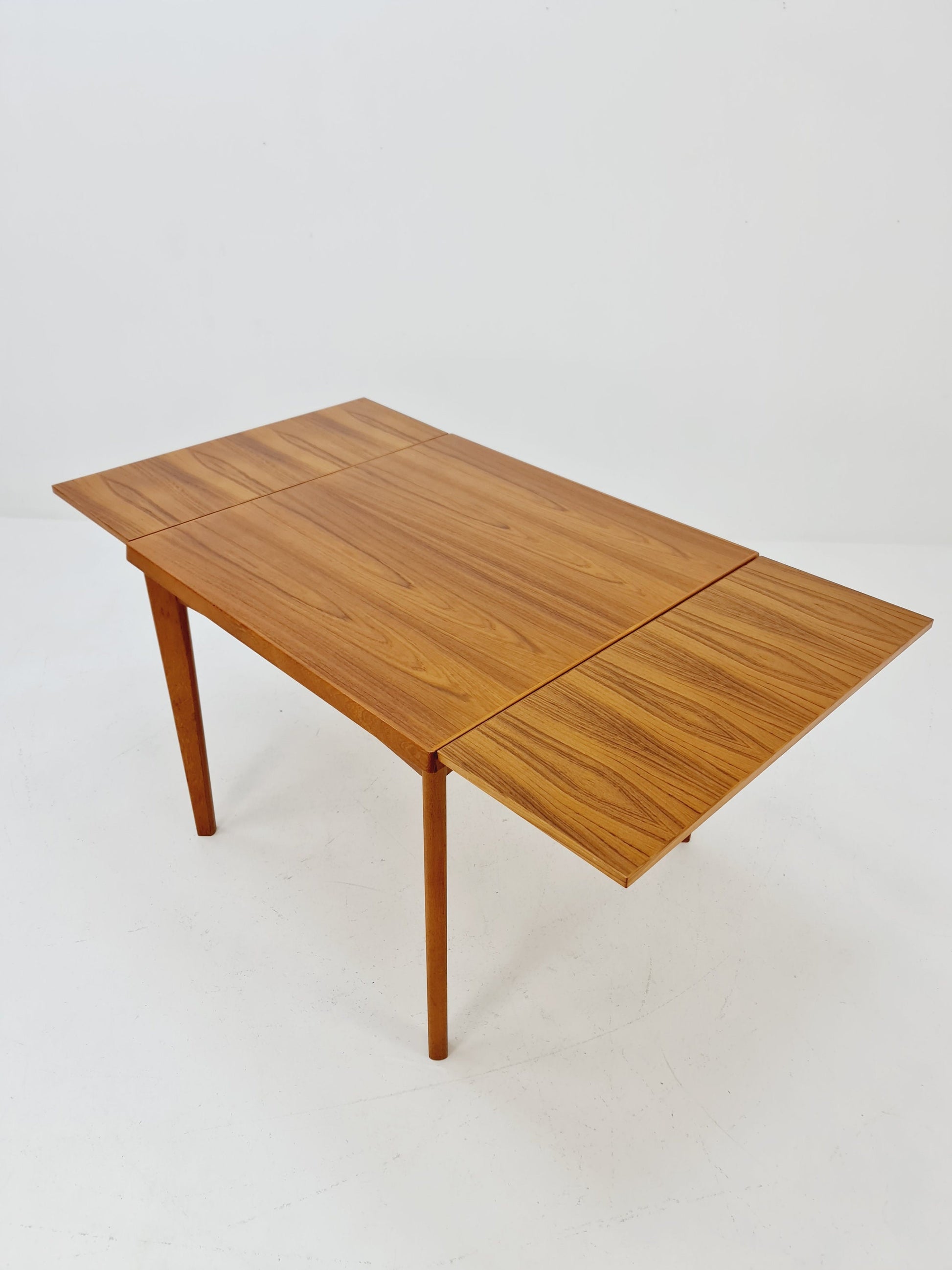 Danish Henning Kjaernulf rectangular teak table with two extension leaves, Denmark 1960s