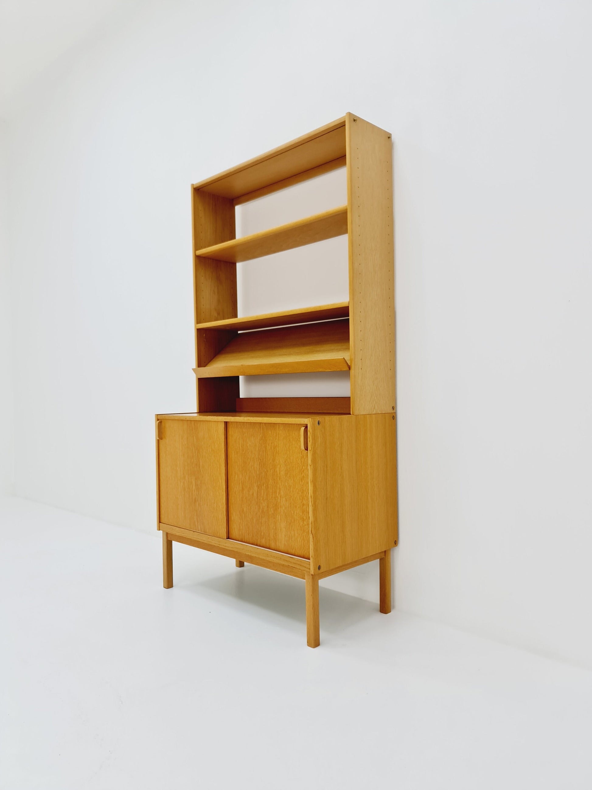 Swedish vintage book case with news Papper shelf oak by Fridhagen for Bodafors, 1960s