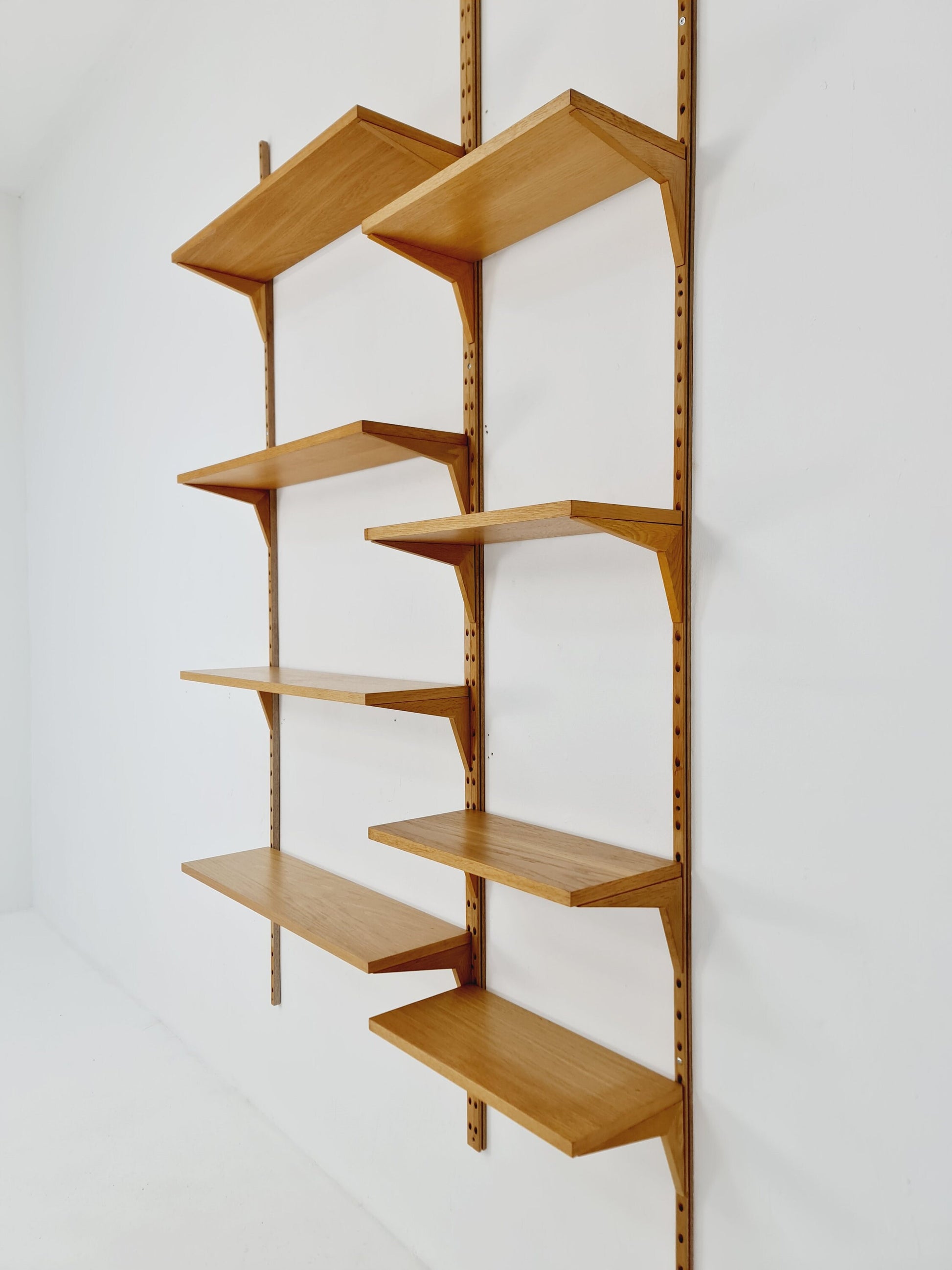 Midcentury Danish Oak Wall-Mounted Shelving Unit, by Poul Cadovius, 1960s