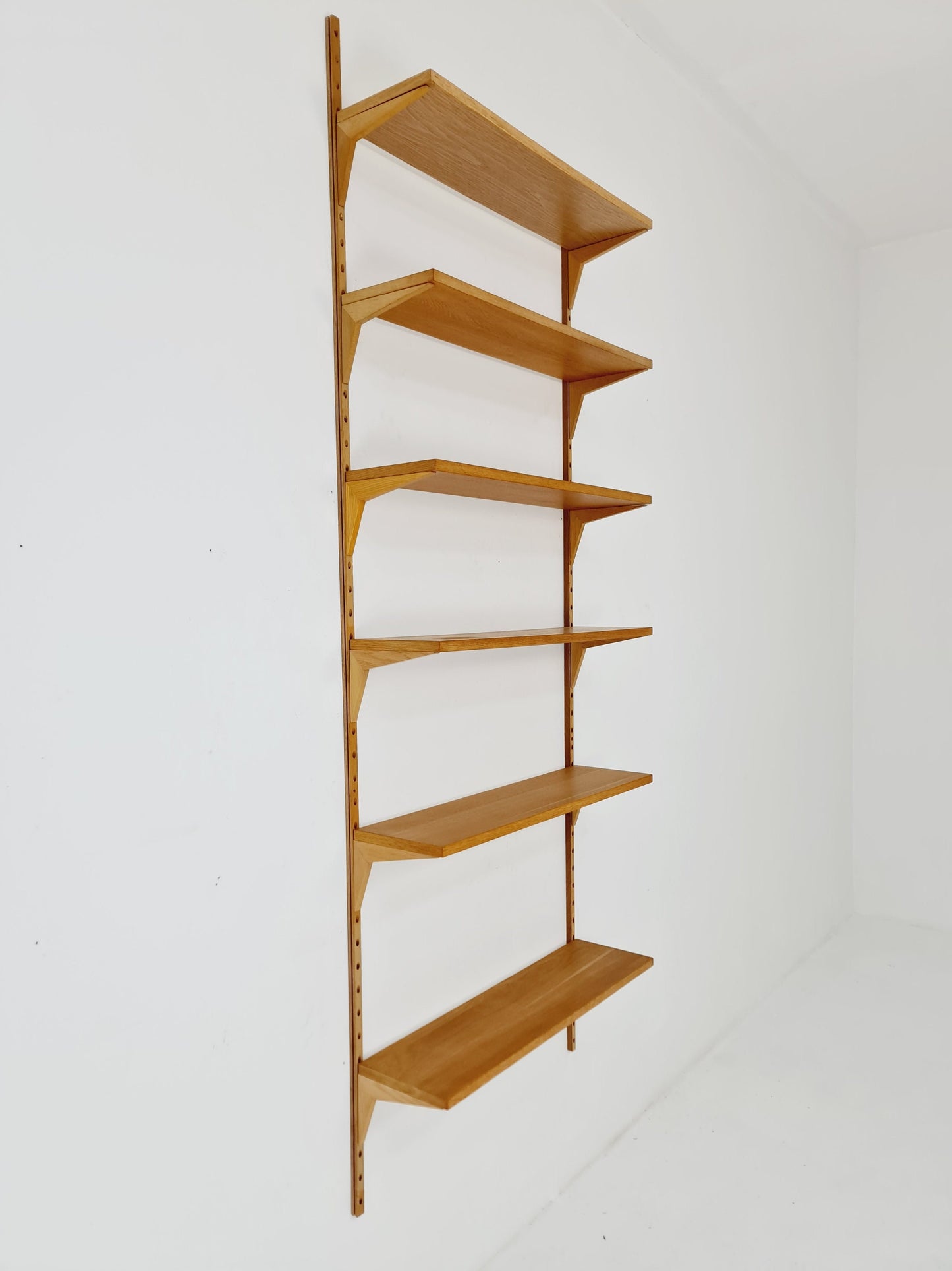 Midcentury Danish Oak Wall-Mounted Shelving Unit, by Poul Cadovius, 1960s