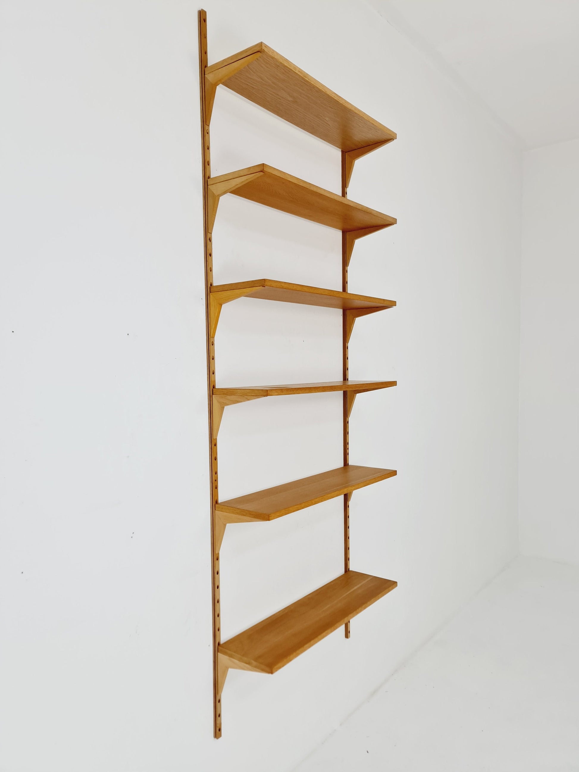 Midcentury Danish Oak Wall-Mounted Shelving Unit, by Poul Cadovius, 1960s