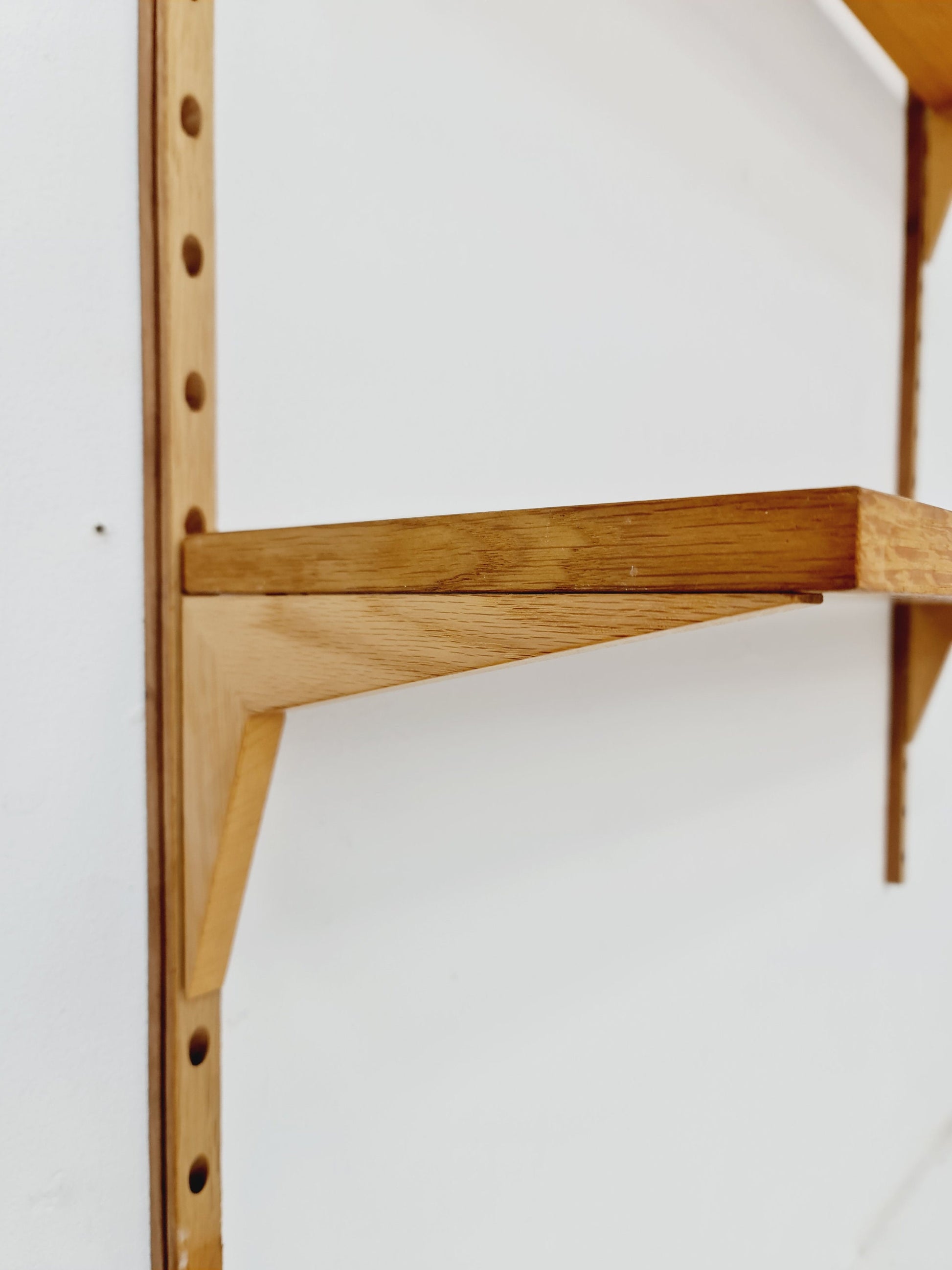 Midcentury Danish Oak Wall-Mounted Shelving Unit, by Poul Cadovius, 1960s