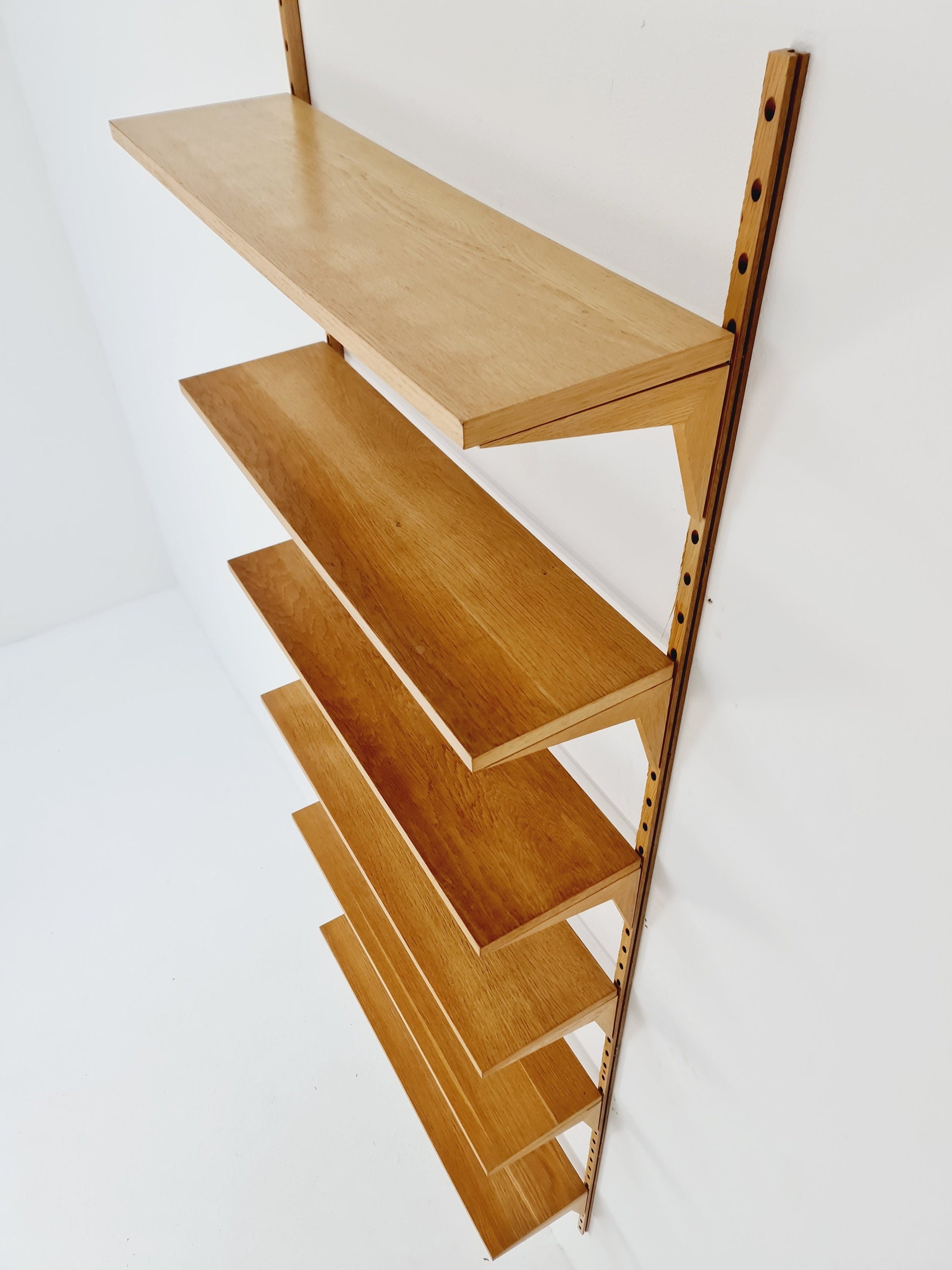 Midcentury Danish Oak Wall-Mounted Shelving Unit, by Poul Cadovius, 1960s