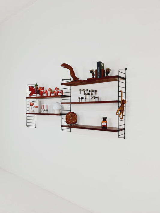 Original MCM Teak shelving system - consists of black lacquered metal ladders, from string Stockholm 1960s