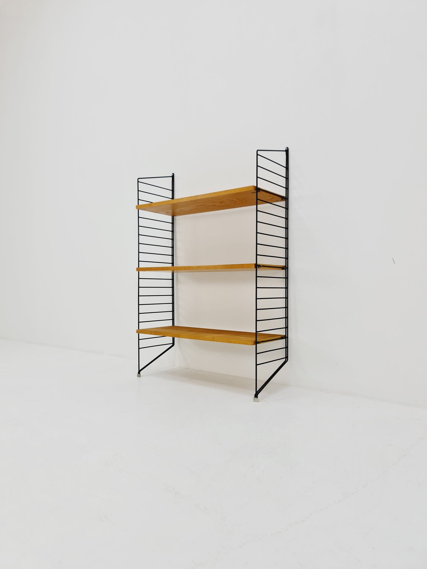 Original MCM Ash wood shelving system - consists of black lacquered metal ladders, from string Stockholm 1960s