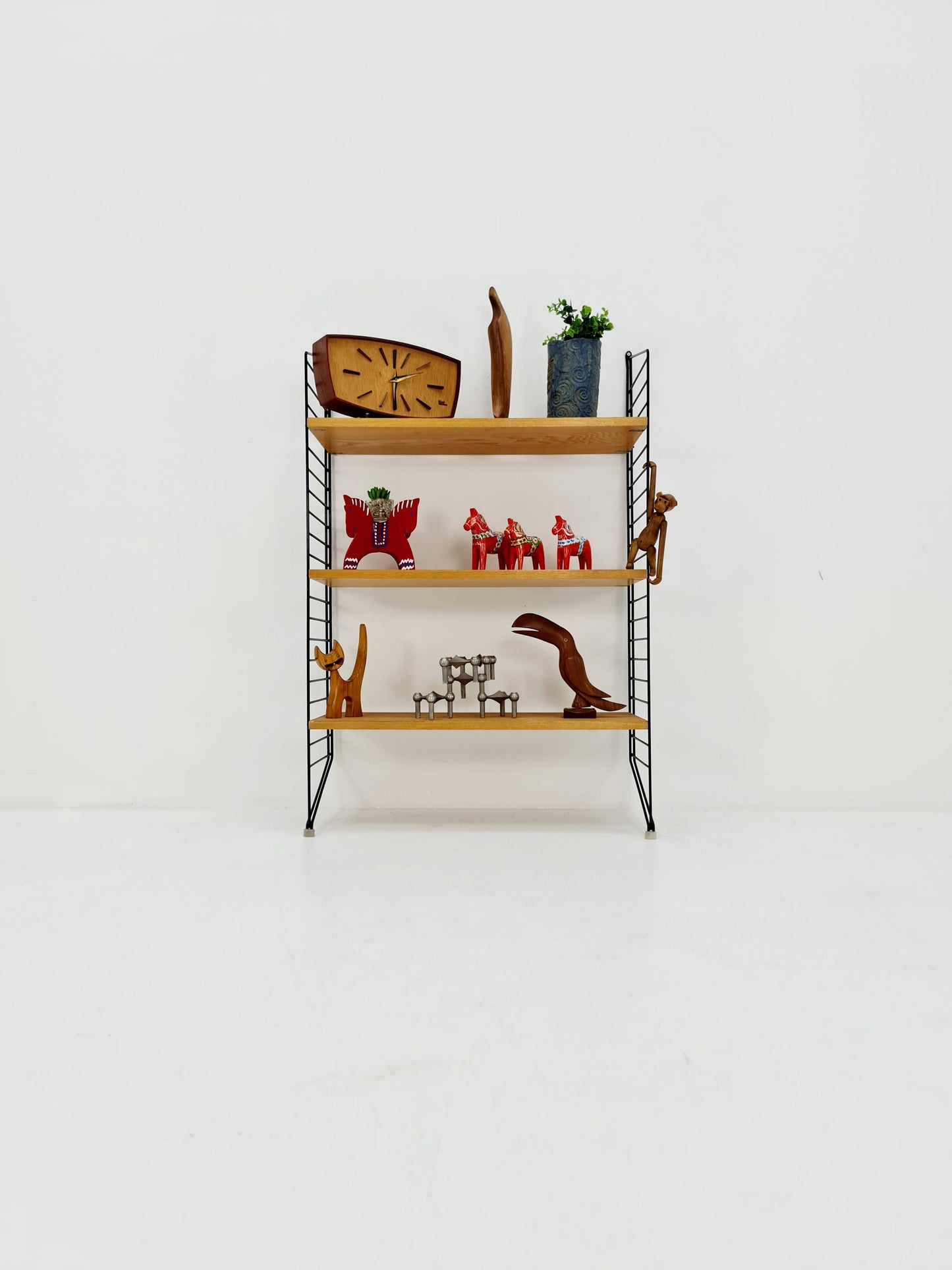 Original MCM Ash wood shelving system - consists of black lacquered metal ladders, from string Stockholm 1960s