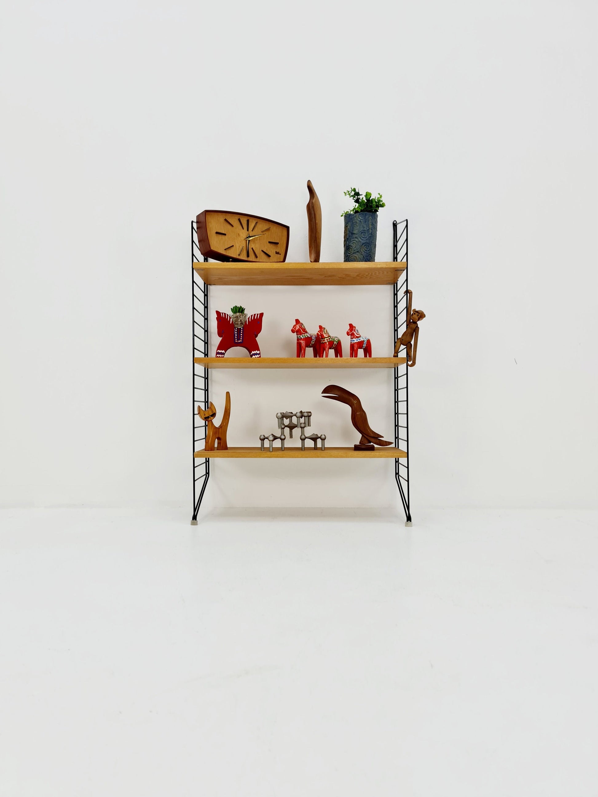 Original MCM Ash wood shelving system - consists of black lacquered metal ladders, from string Stockholm 1960s