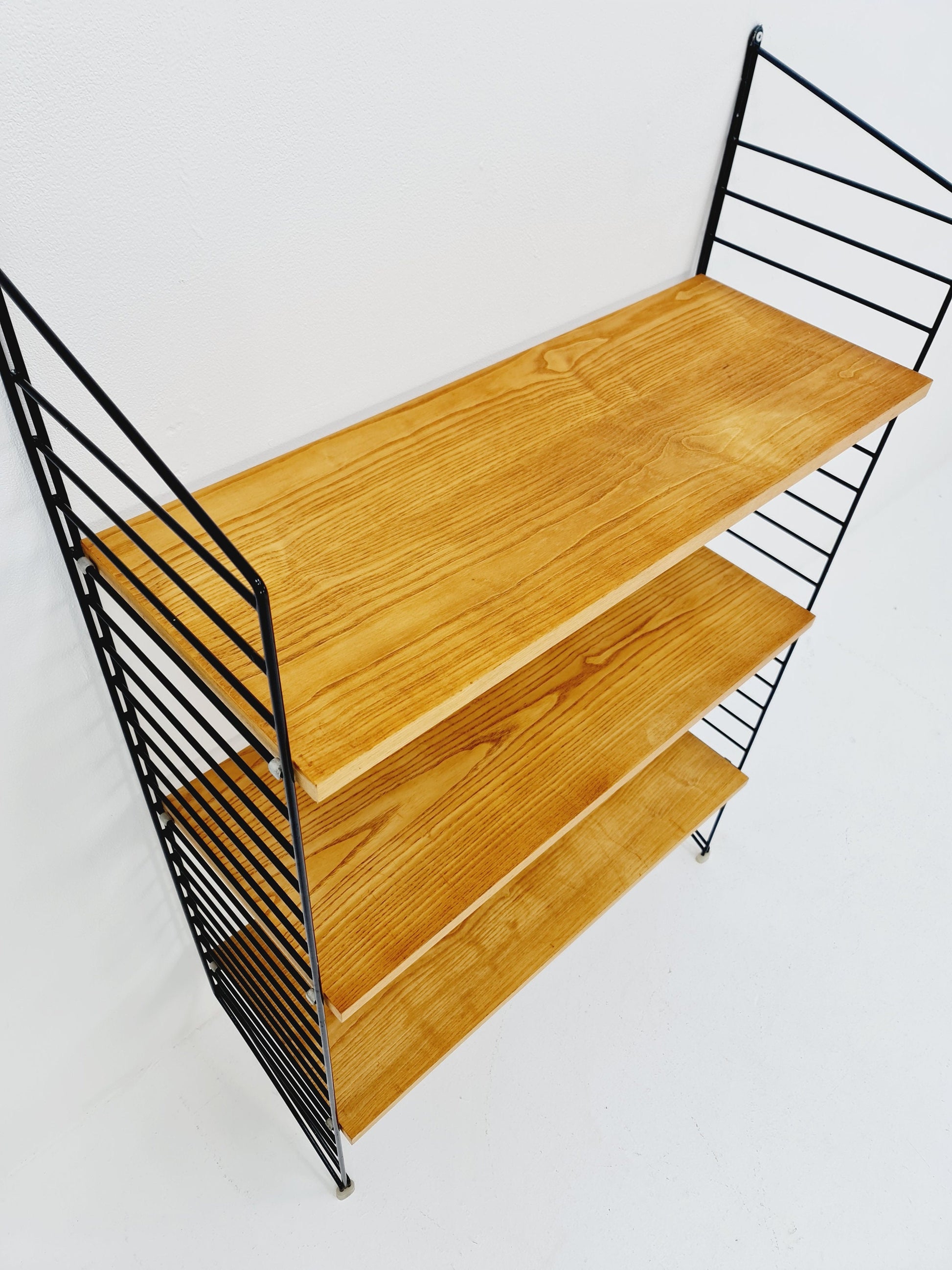 Original MCM Ash wood shelving system - consists of black lacquered metal ladders, from string Stockholm 1960s