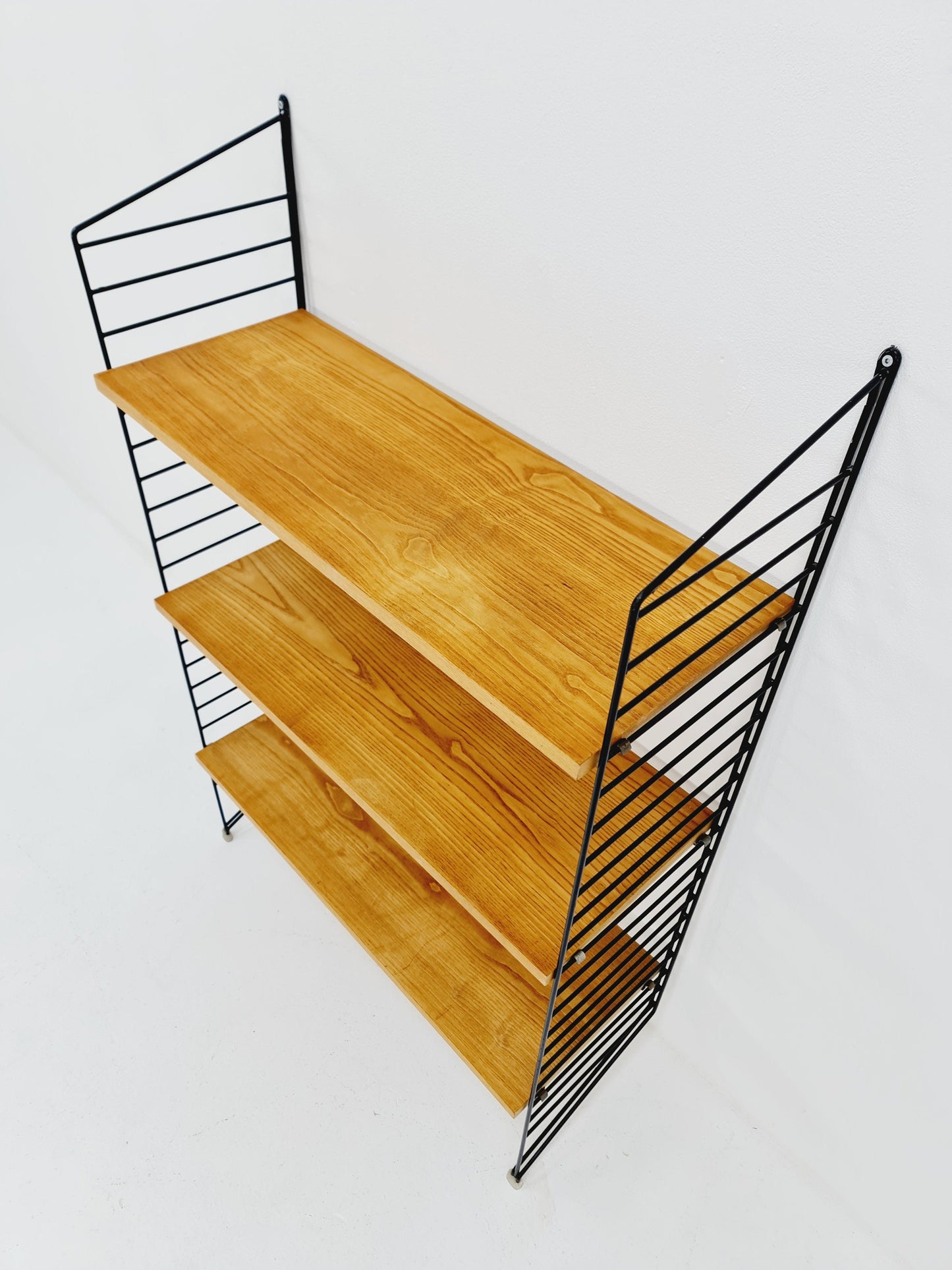 Original MCM Ash wood shelving system - consists of black lacquered metal ladders, from string Stockholm 1960s