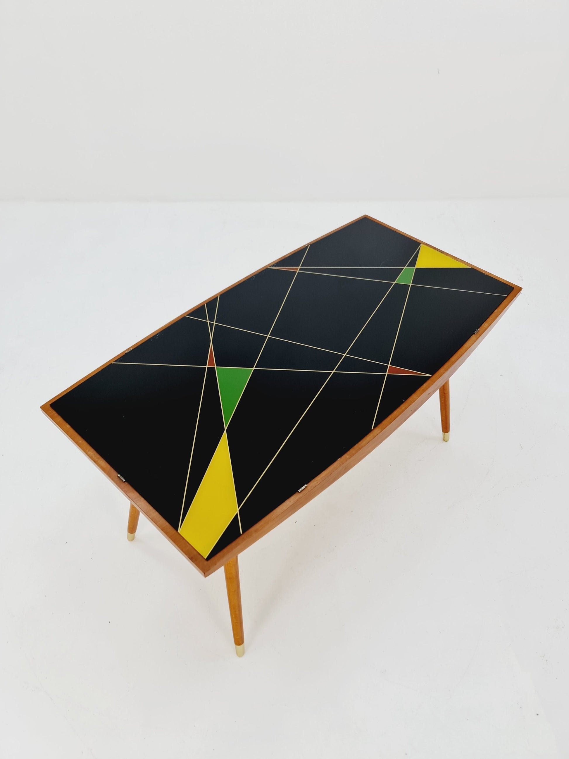 mid centtury vintage coffetable witth glass top from the 50s