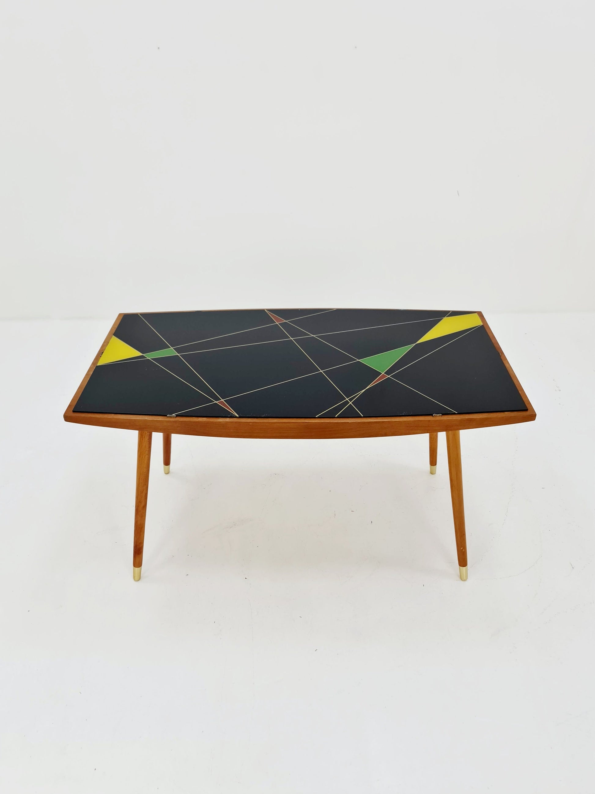 mid centtury vintage coffetable witth glass top from the 50s