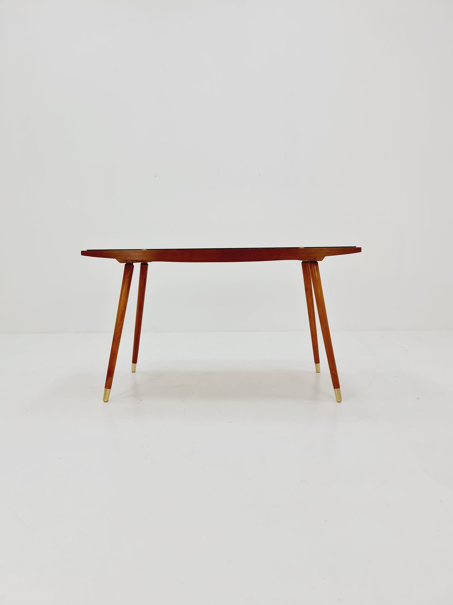 mid centtury vintage coffetable witth glass top from the 50s