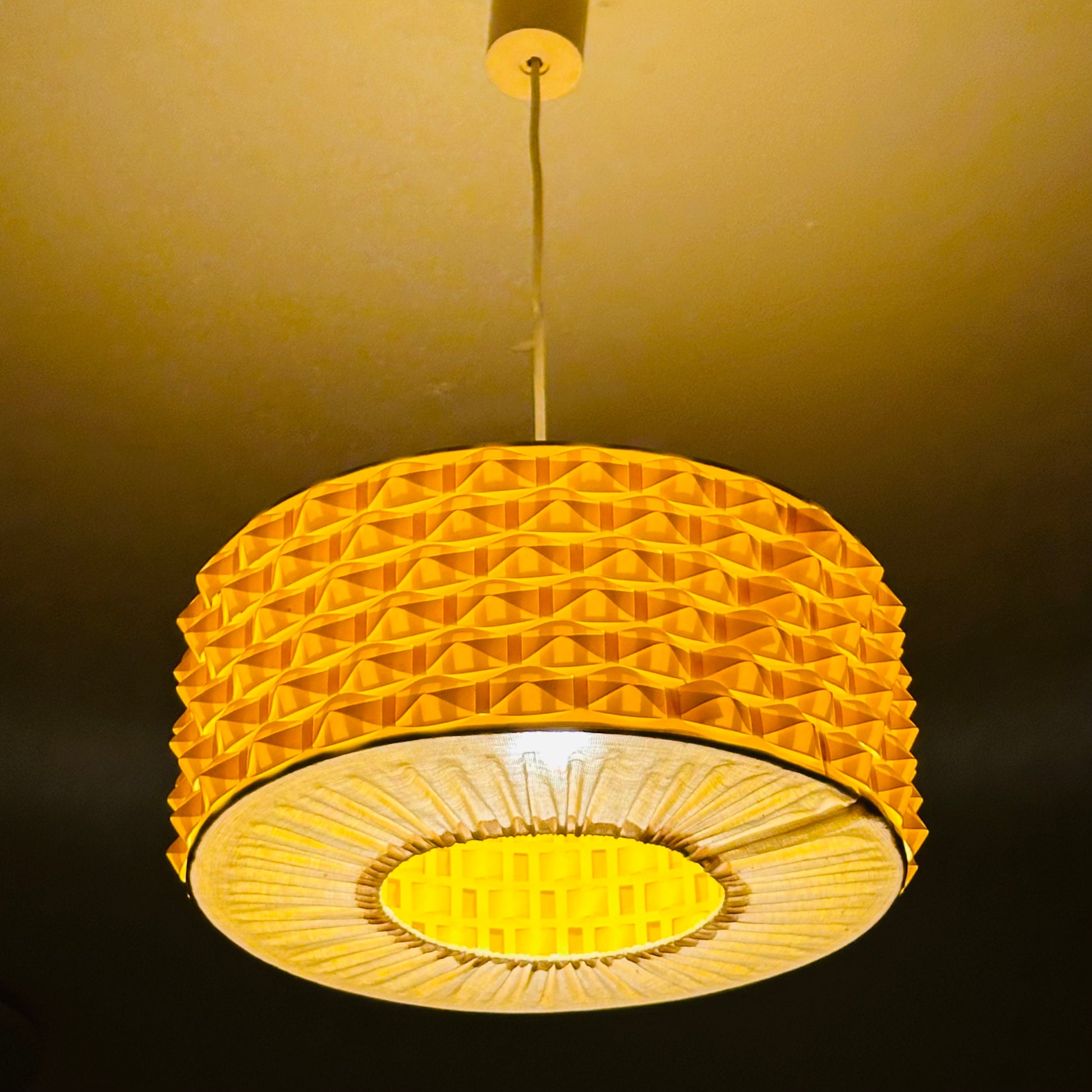Rare Space age yellow plastic pendant lamp with fabric details 1970s