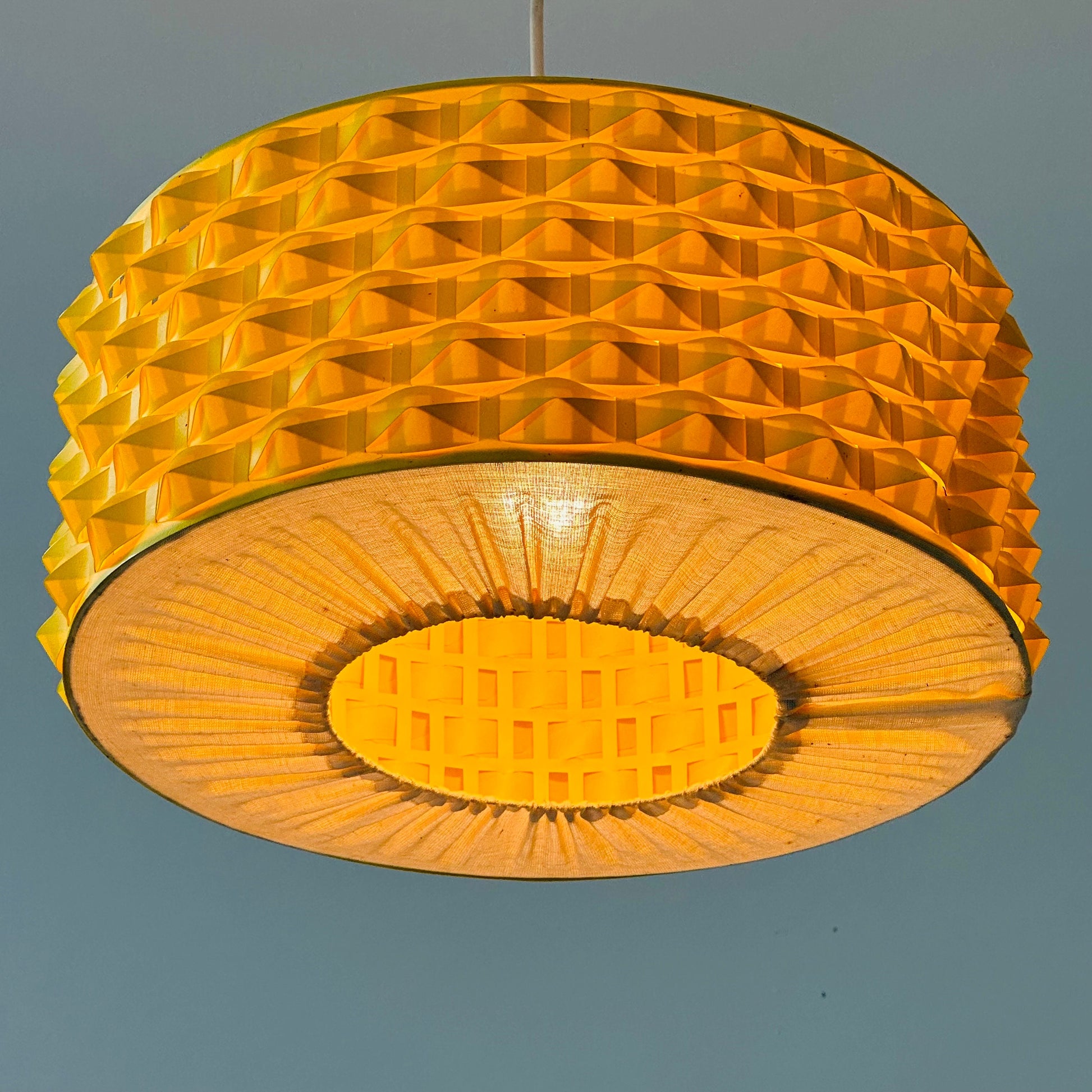 Rare Space age yellow plastic pendant lamp with fabric details 1970s