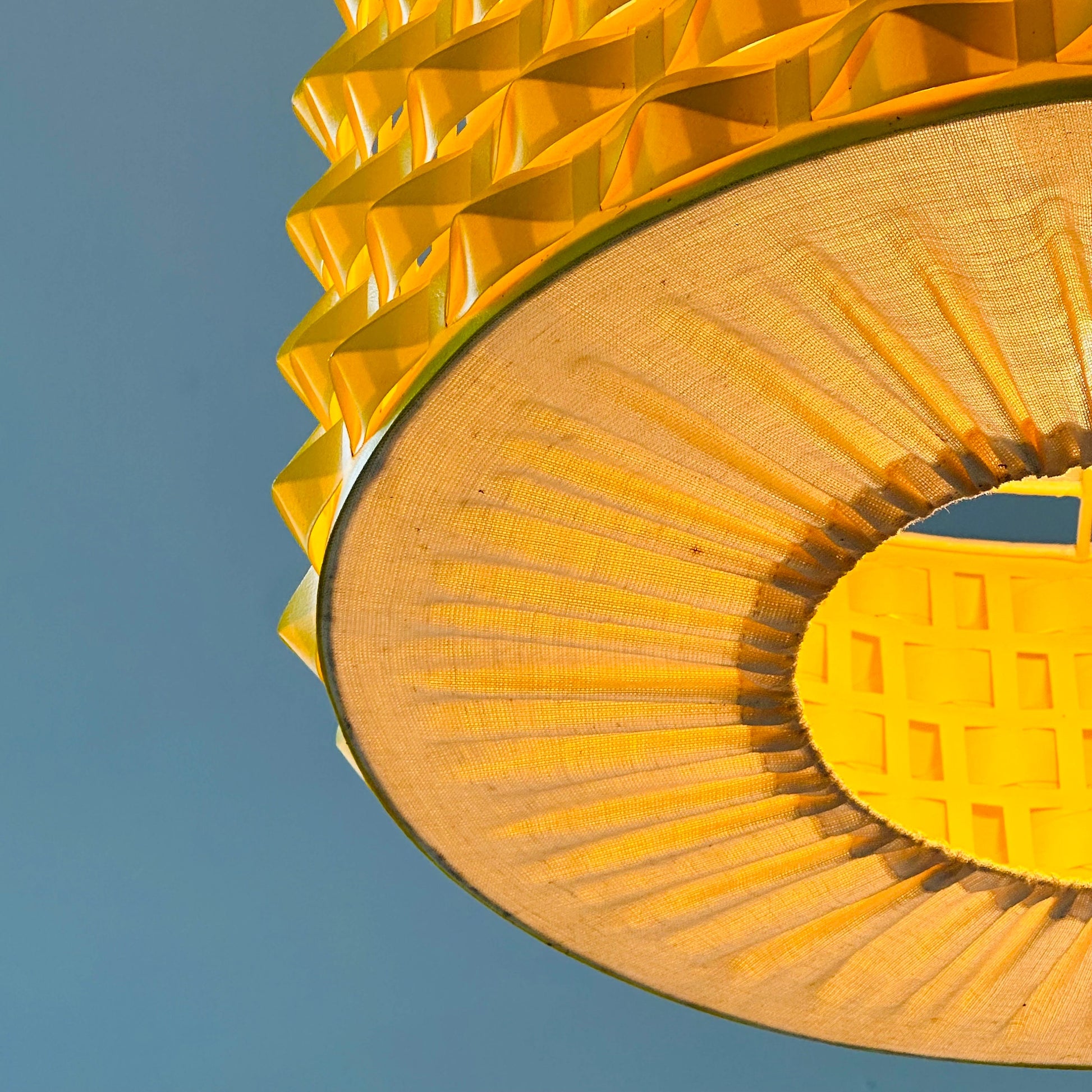 Rare Space age yellow plastic pendant lamp with fabric details 1970s