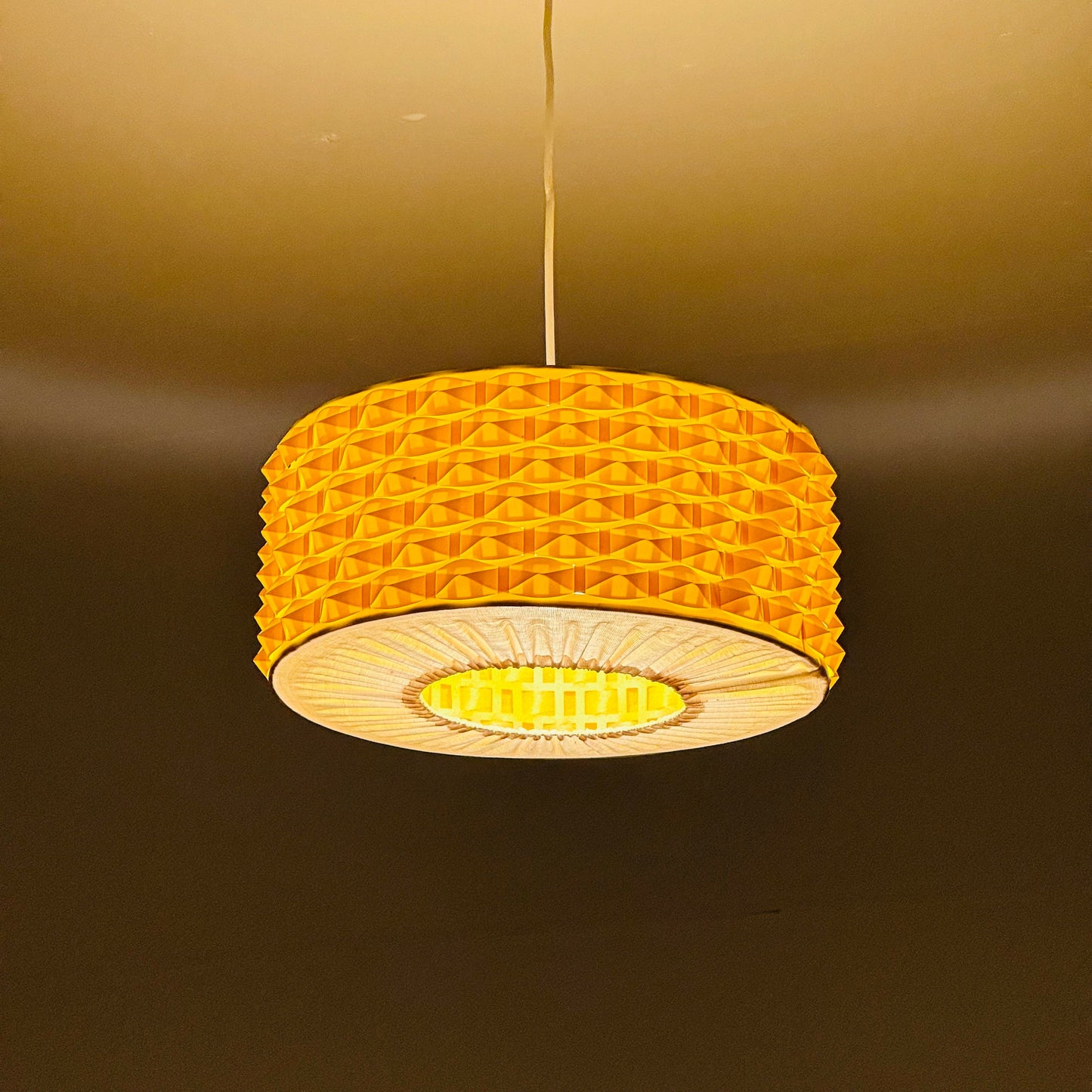 Rare Space age yellow plastic pendant lamp with fabric details 1970s