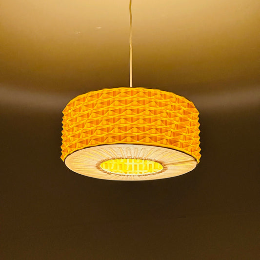 Rare Space age yellow plastic pendant lamp with fabric details 1970s