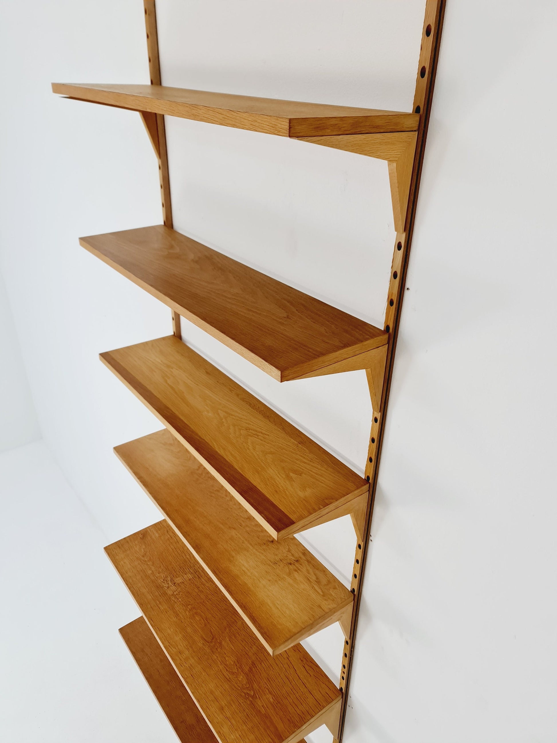 Midcentury Danish Oak Wall-Mounted Shelving Unit, by Poul Cadovius, 1960s