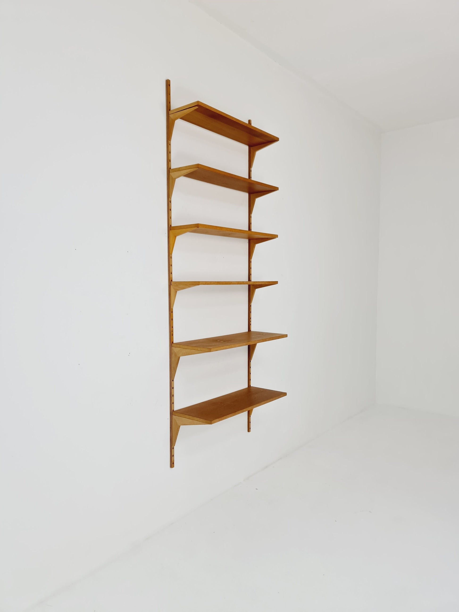 Midcentury Danish Oak Wall-Mounted Shelving Unit, by Poul Cadovius, 1960s