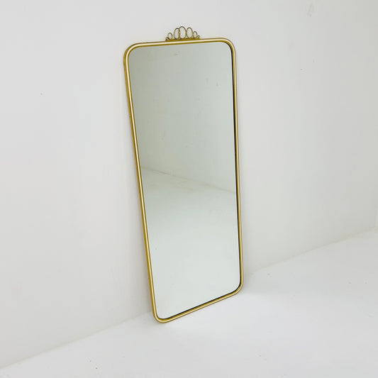 Mid century brass wall mirror with decorative bow 1950s, Italy