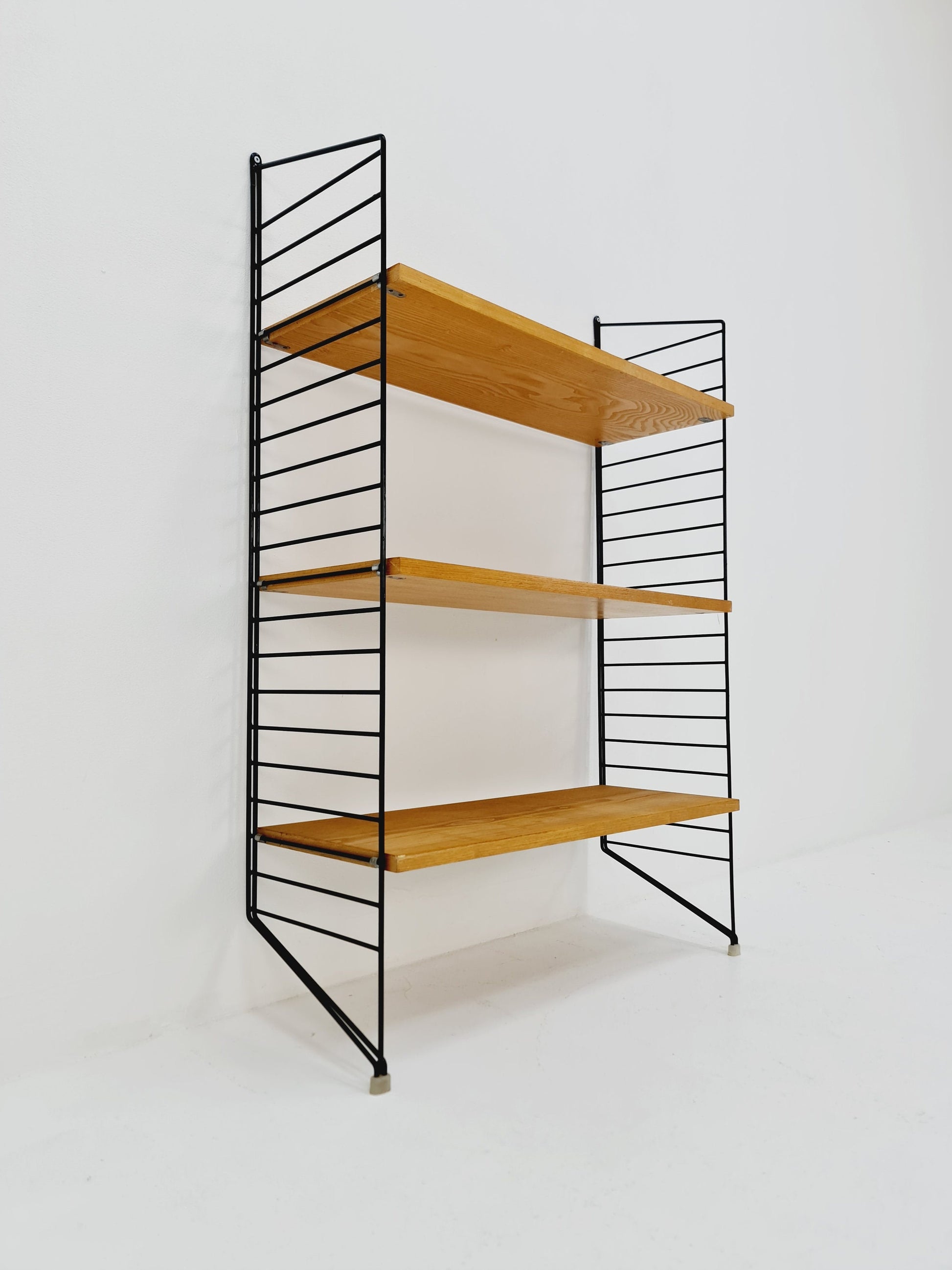 Original MCM Ash wood shelving system - consists of black lacquered metal ladders, from string Stockholm 1960s