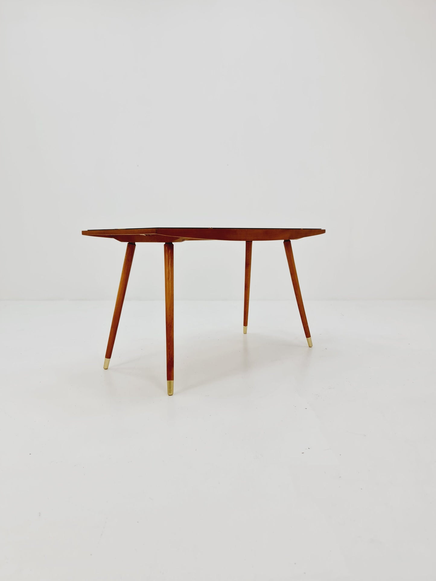 mid centtury vintage coffetable witth glass top from the 50s