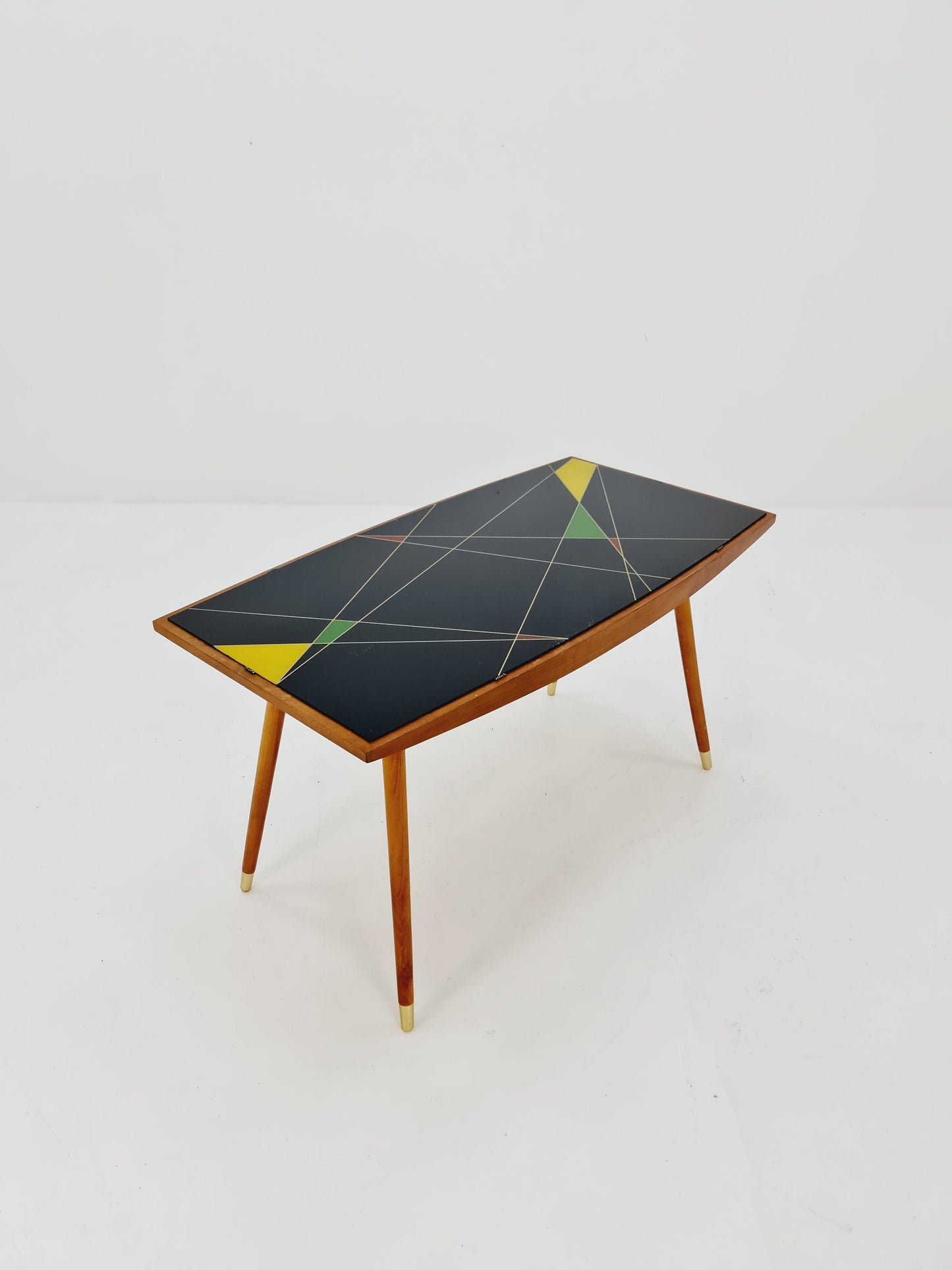 mid centtury vintage coffetable witth glass top from the 50s