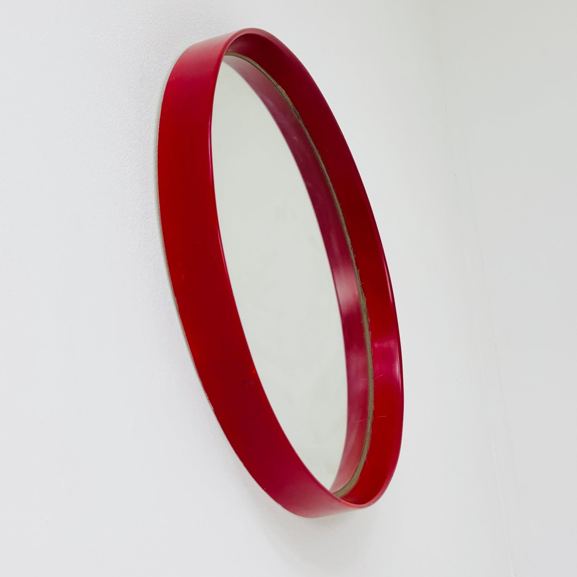 Very nice Red Spaceage vintage mirror plastic from the 70s with a typical Spaceage design,