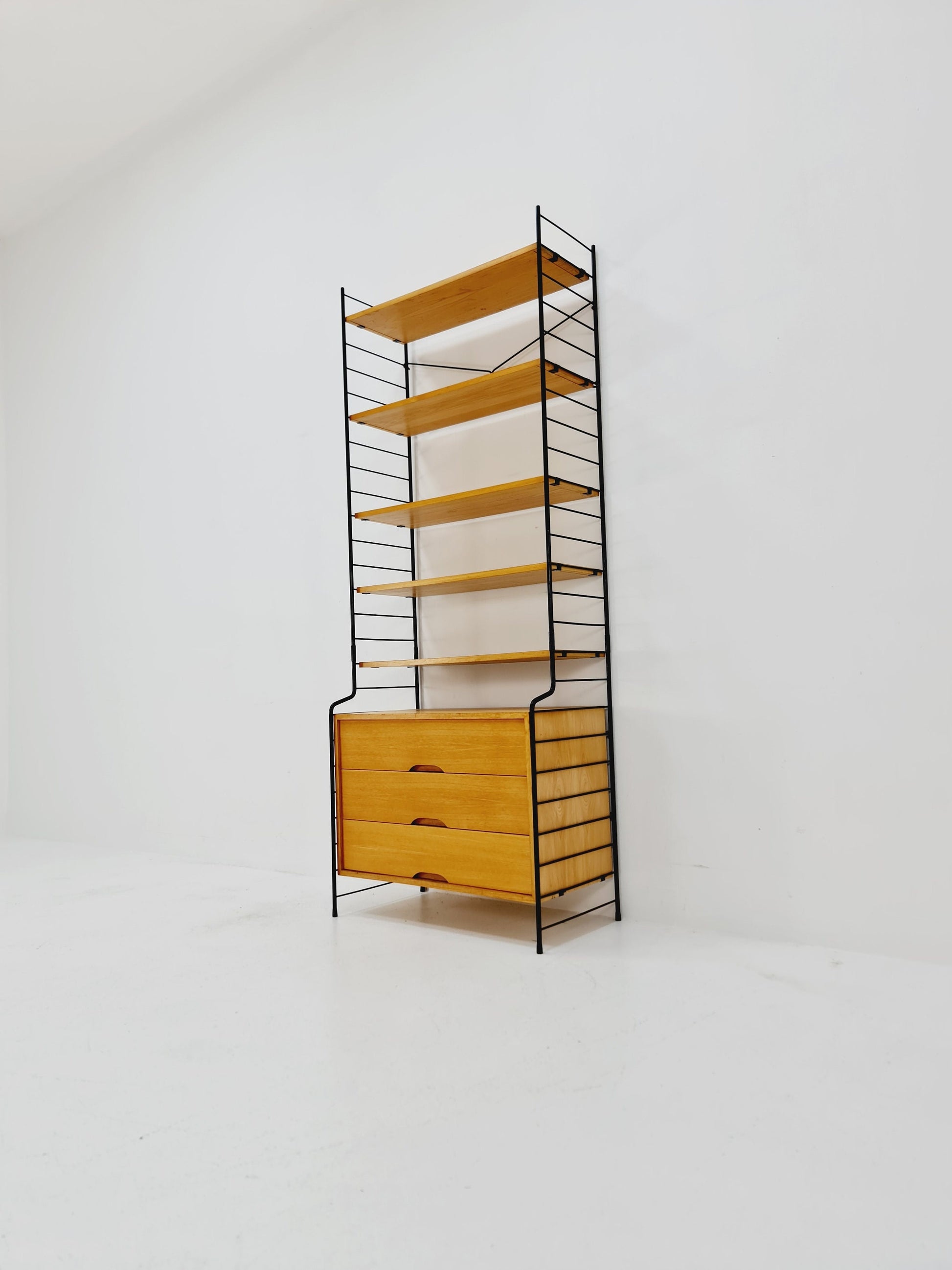 Freestanding vintage string bookshelf in Eshe , 1950s by WHB Germnay