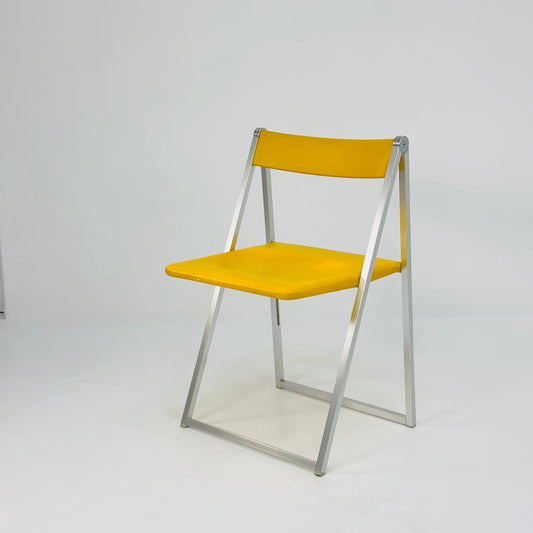 space age folding yellow chair by interlubke Germany 1980s