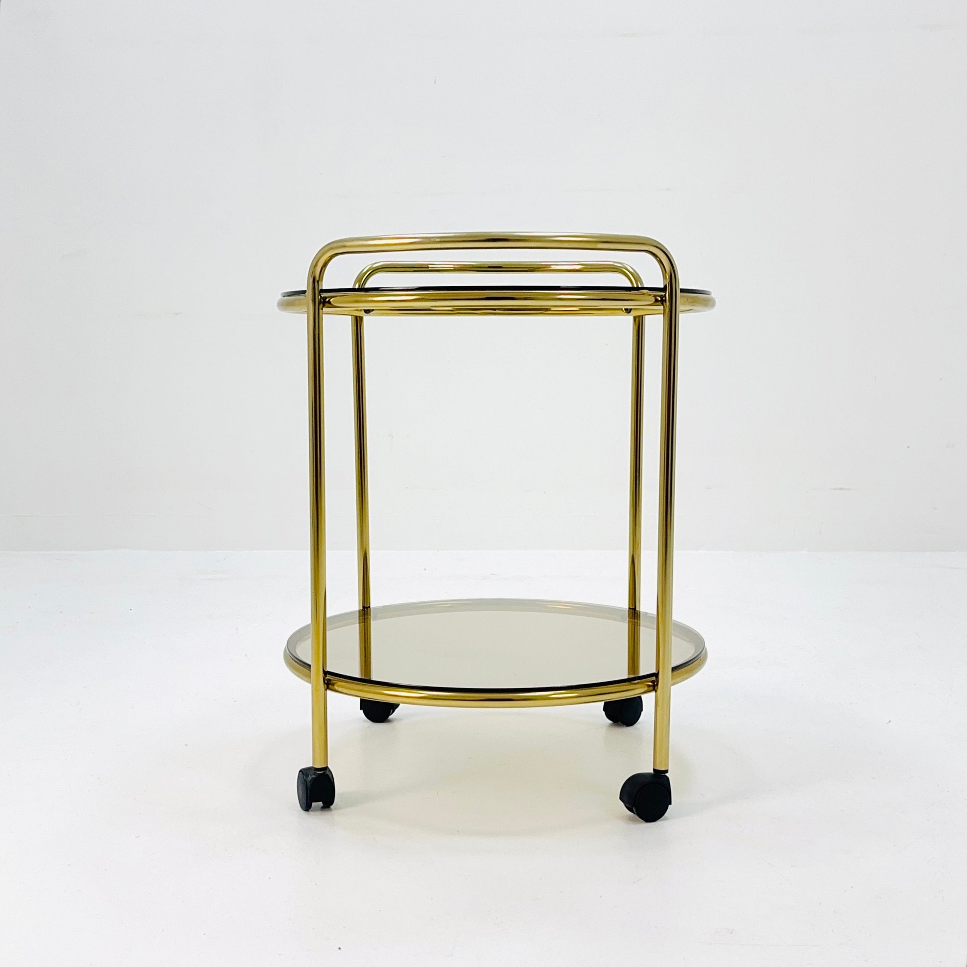 Mid Century Modern Bar/ Tea Cart Gold/Brass smoked Glass France 1970s .