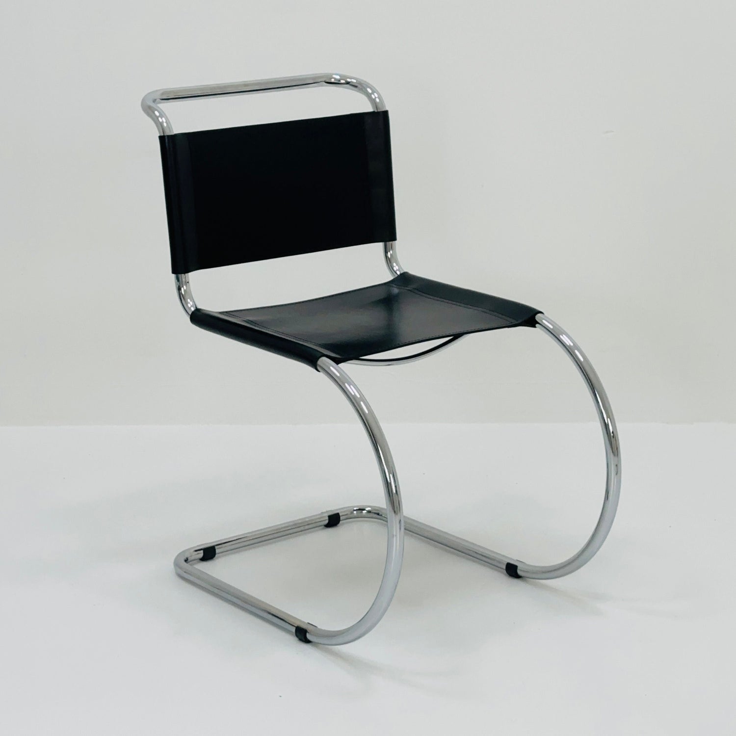 MR10 lounge black leather chair design by Ludwig Mies van der Rohe , 1980s