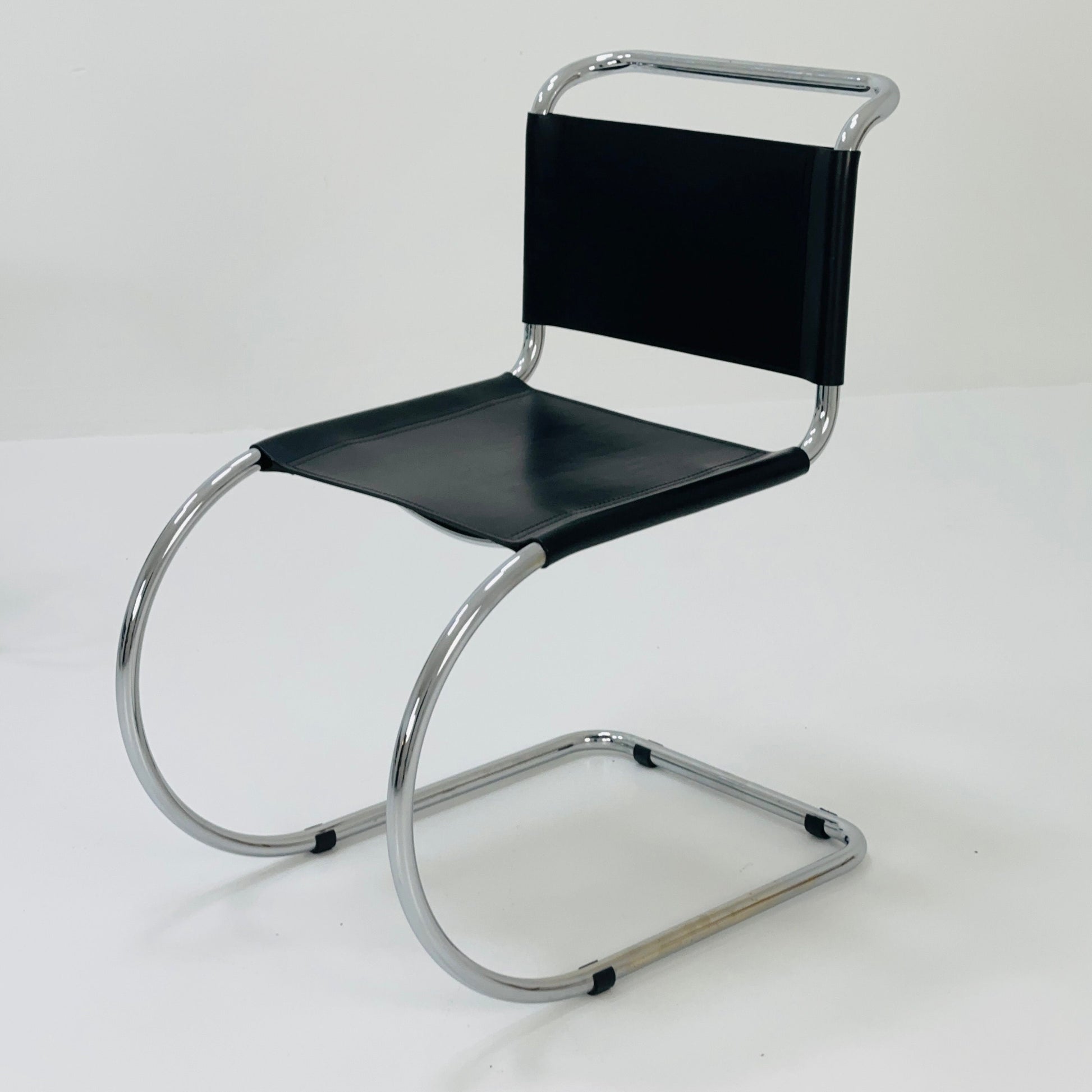 MR10 lounge black leather chair design by Ludwig Mies van der Rohe , 1980s