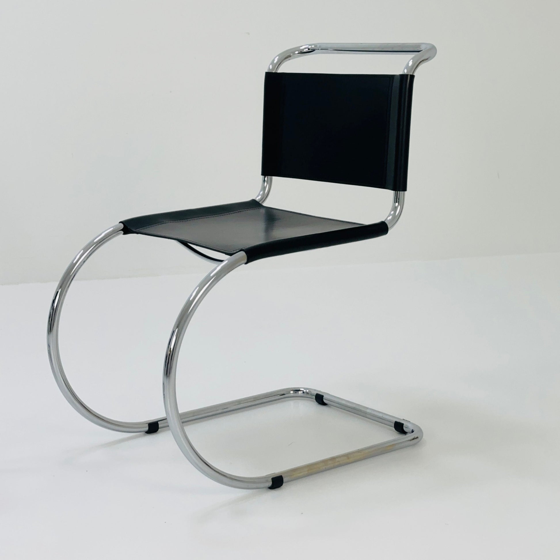 MR10 lounge black leather chair design by Ludwig Mies van der Rohe , 1980s