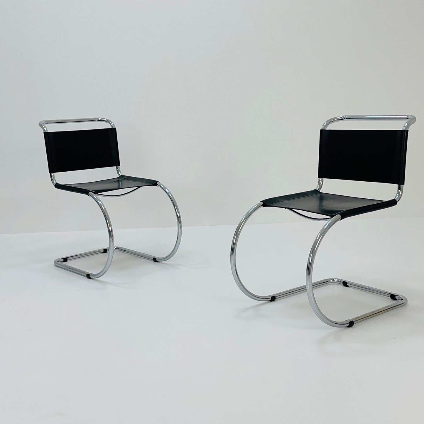 MR10 lounge black leather chair design by Ludwig Mies van der Rohe , 1980s