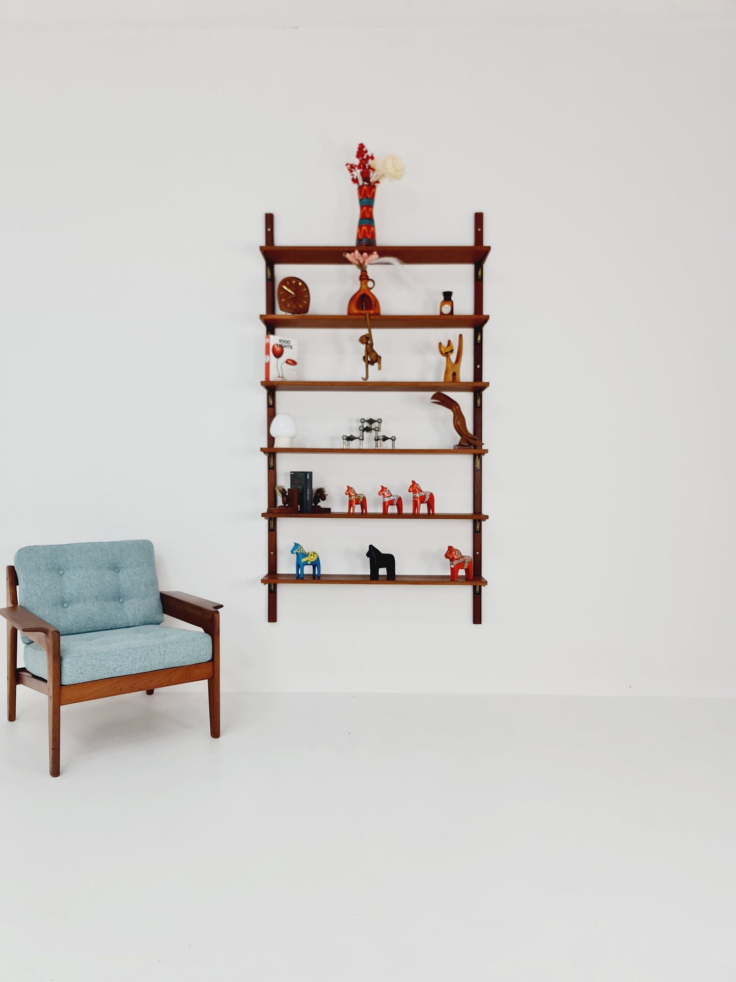 Rare Wall-mounted original teak Danish brass shelf-system bookcase, 1960s