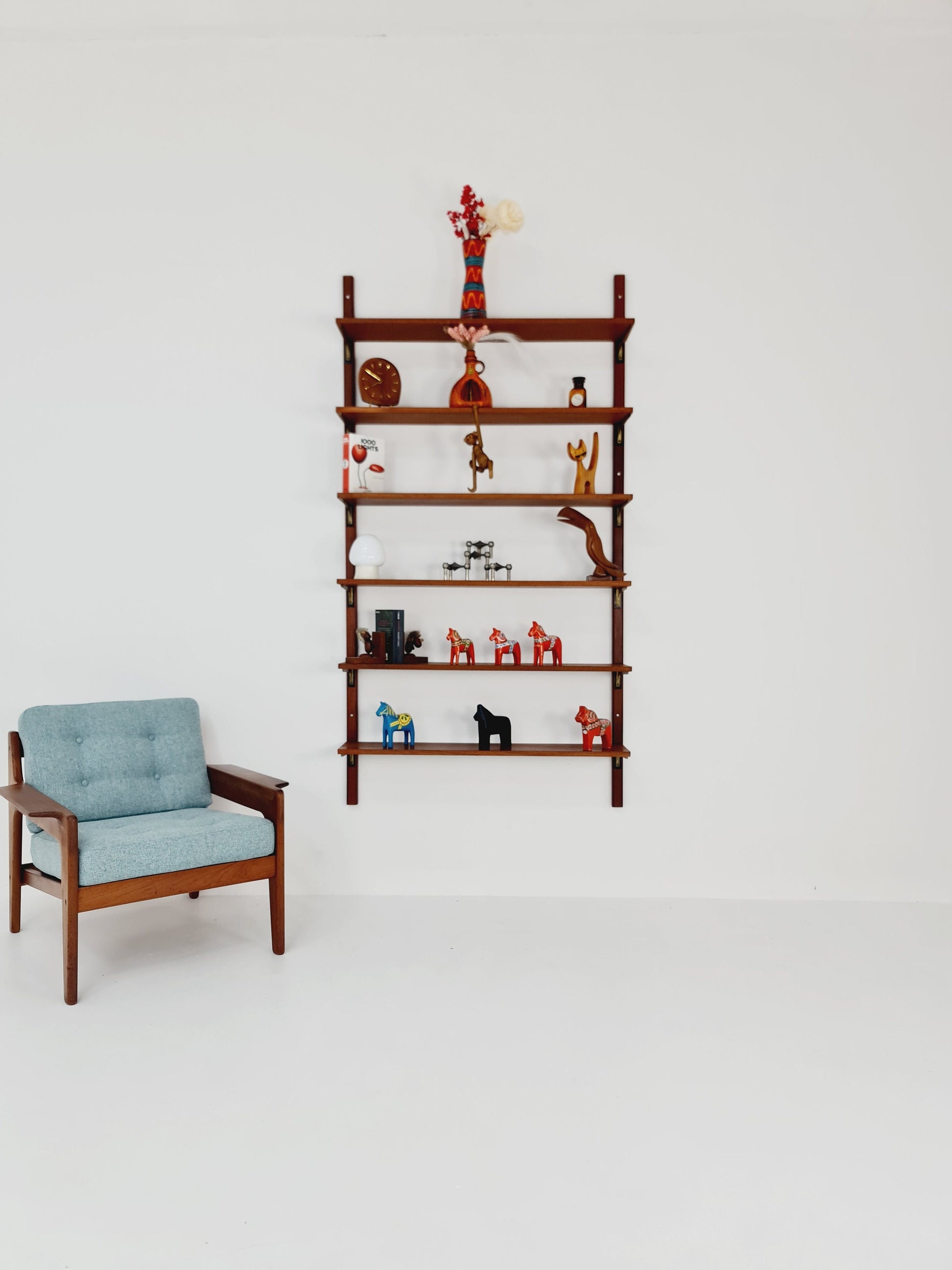 Rare Wall-mounted original teak Danish brass shelf-system bookcase, 1960s