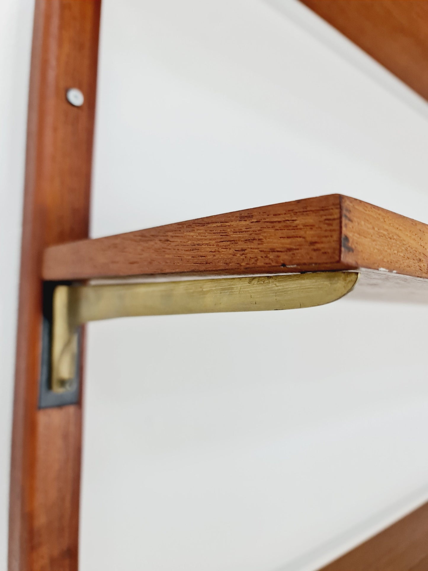 Rare Wall-mounted original teak Danish brass shelf-system bookcase, 1960s