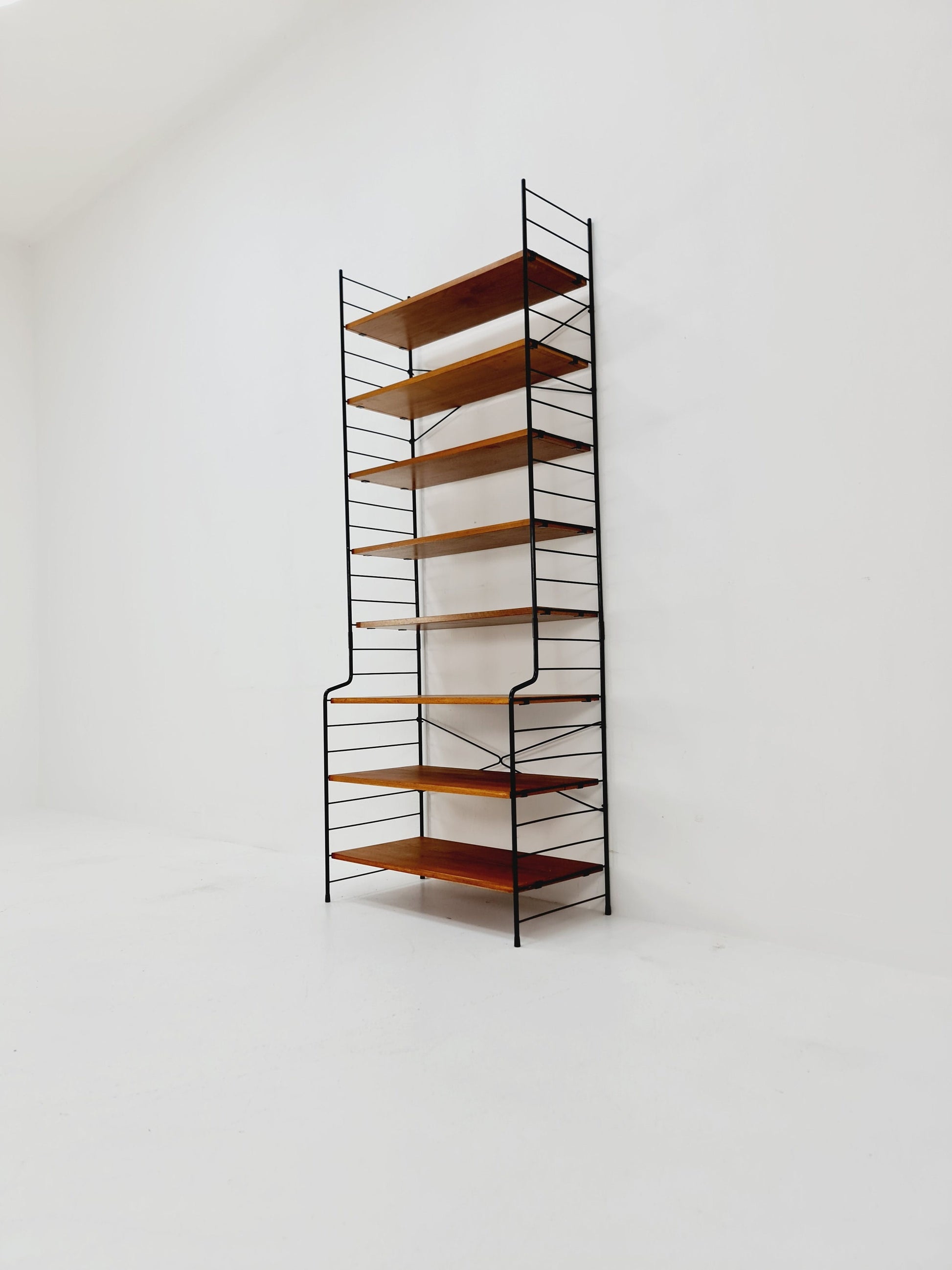 Freestanding vintage string bookshelf in Teak, 1950s by WHB Germnay